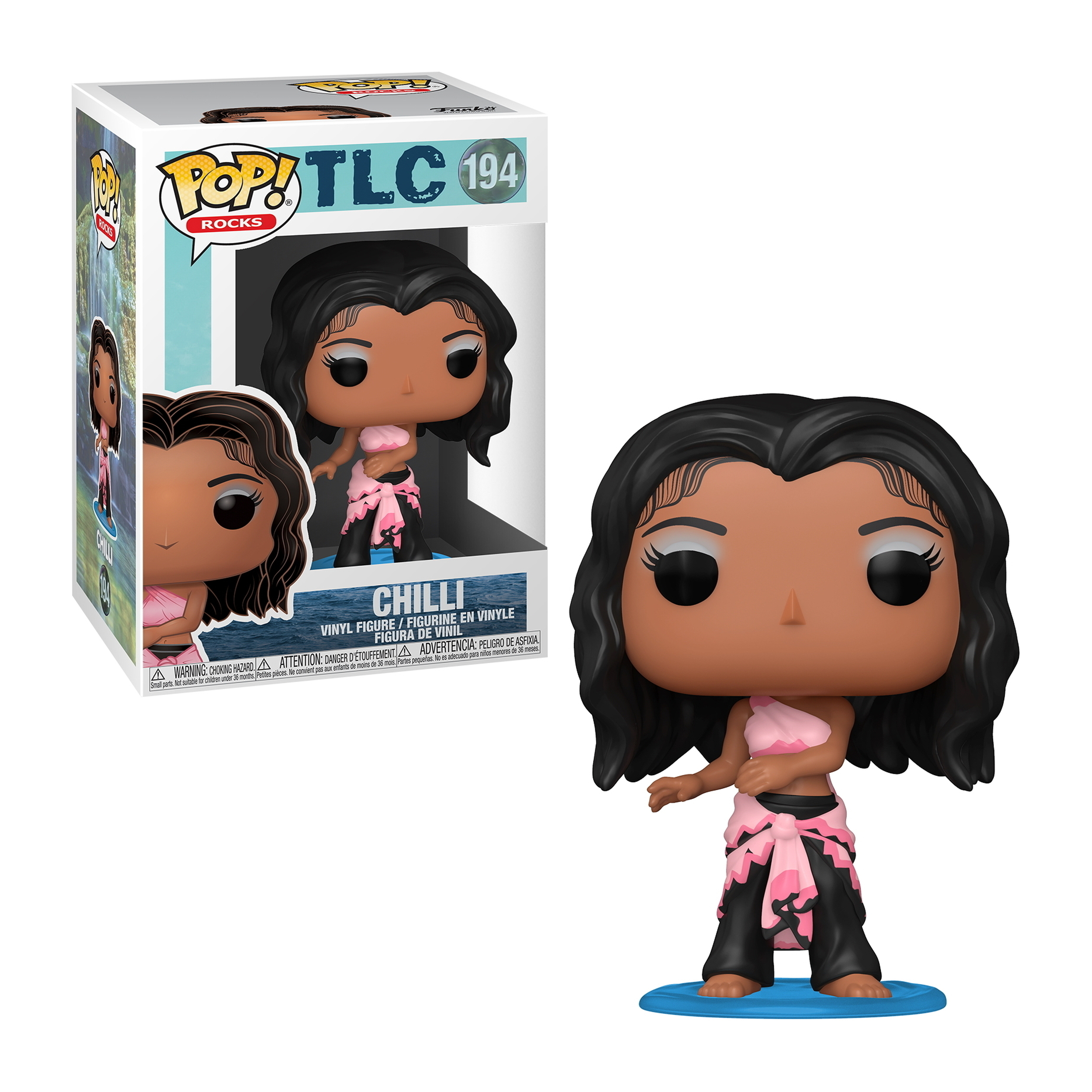 Chilli Funko Pop Figur. Schwarze Haare, pink-schwarzes Outfit, steht auf blauer Basis. Box im Hintergrund.