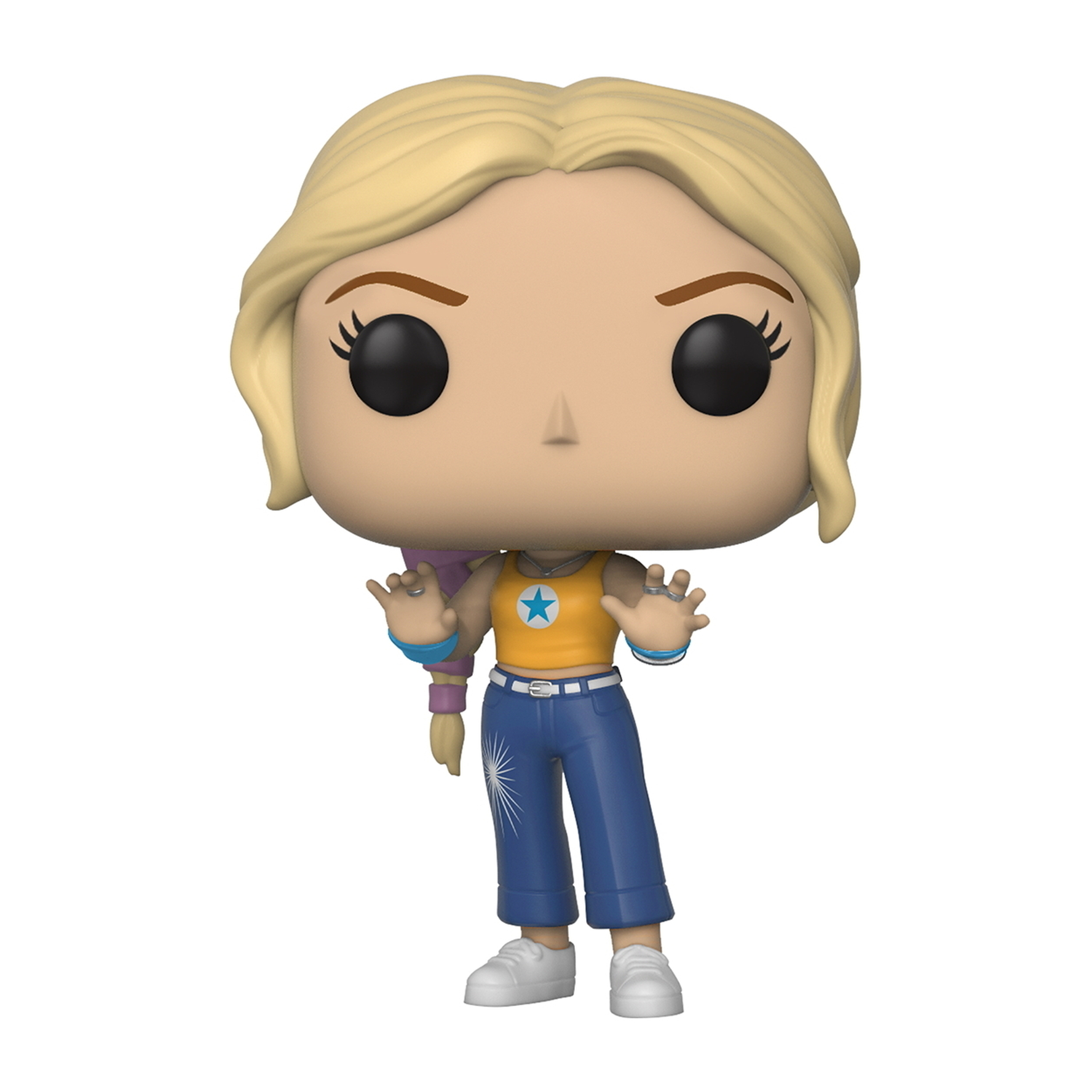 Una figura Funko Pop di una donna bionda con una camicia gialla e jeans blu. Tiene in mano un oggetto viola.