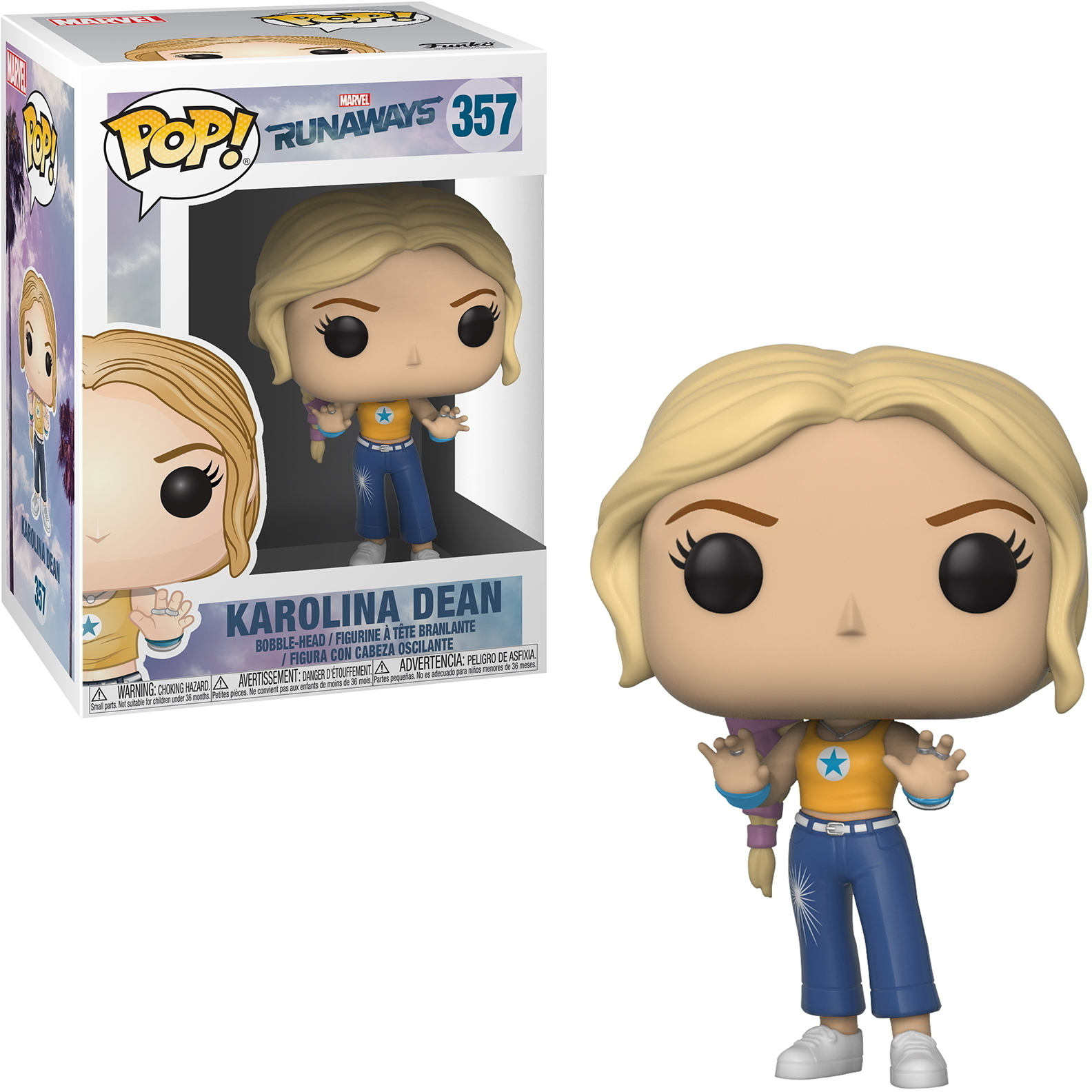 Figura di Karolina Dean, capelli biondi, con top giallo e jeans blu. La scatola mostra la figura.