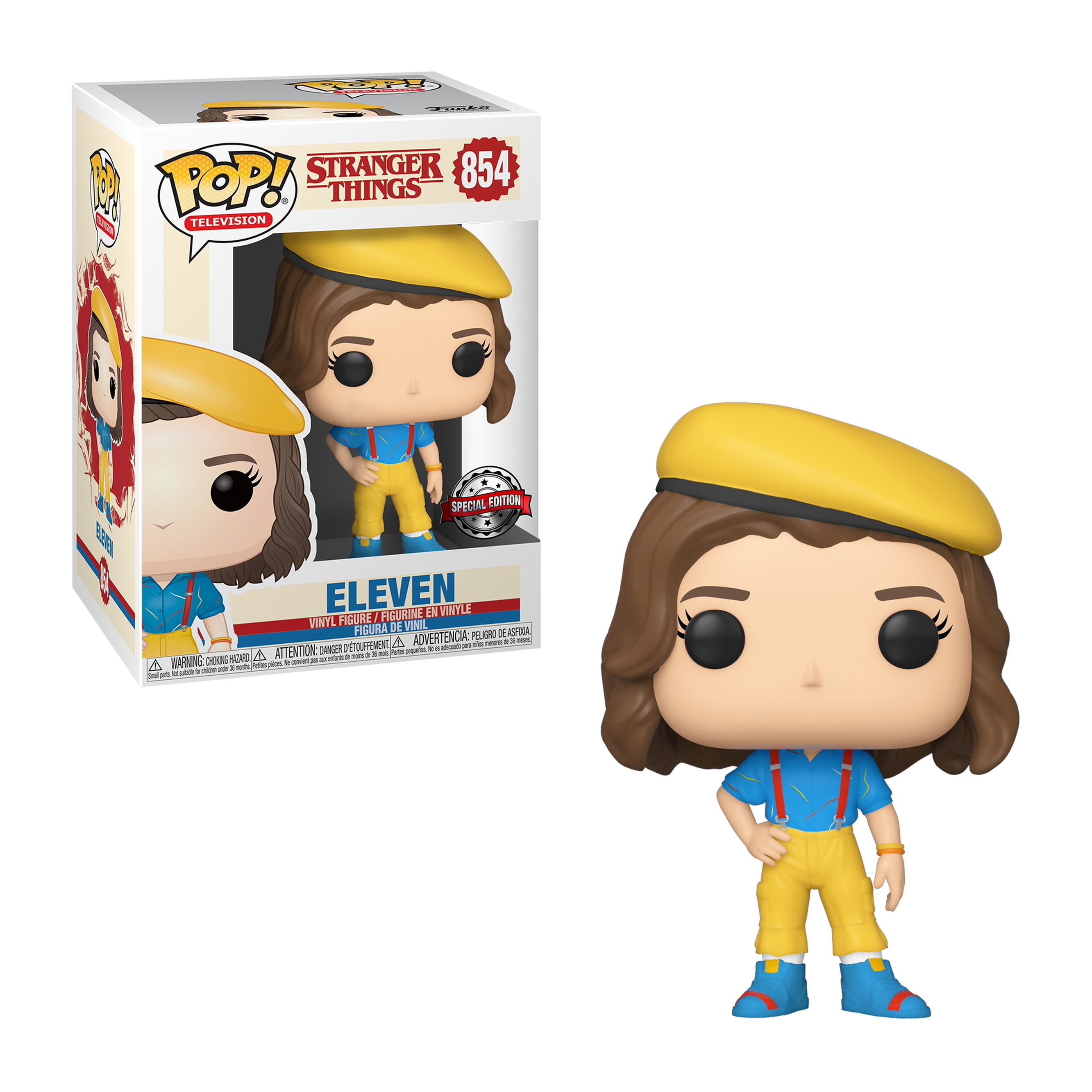 Funko Pop von Eleven aus Stranger Things in gelber Baskenmütze und Latzhose. Daneben steht eine Box.