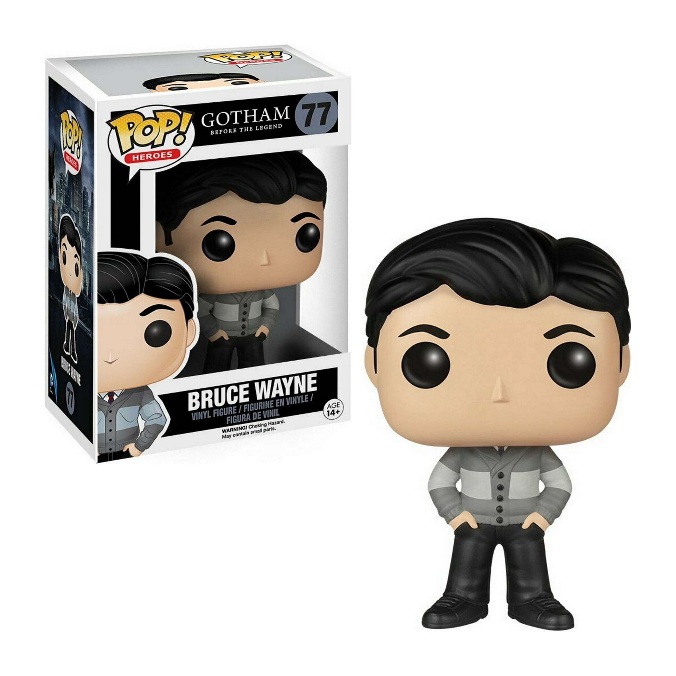Bruce Wayne Funko Pop Figur in grauem und schwarzem Outfit, mit thematischem Karton.