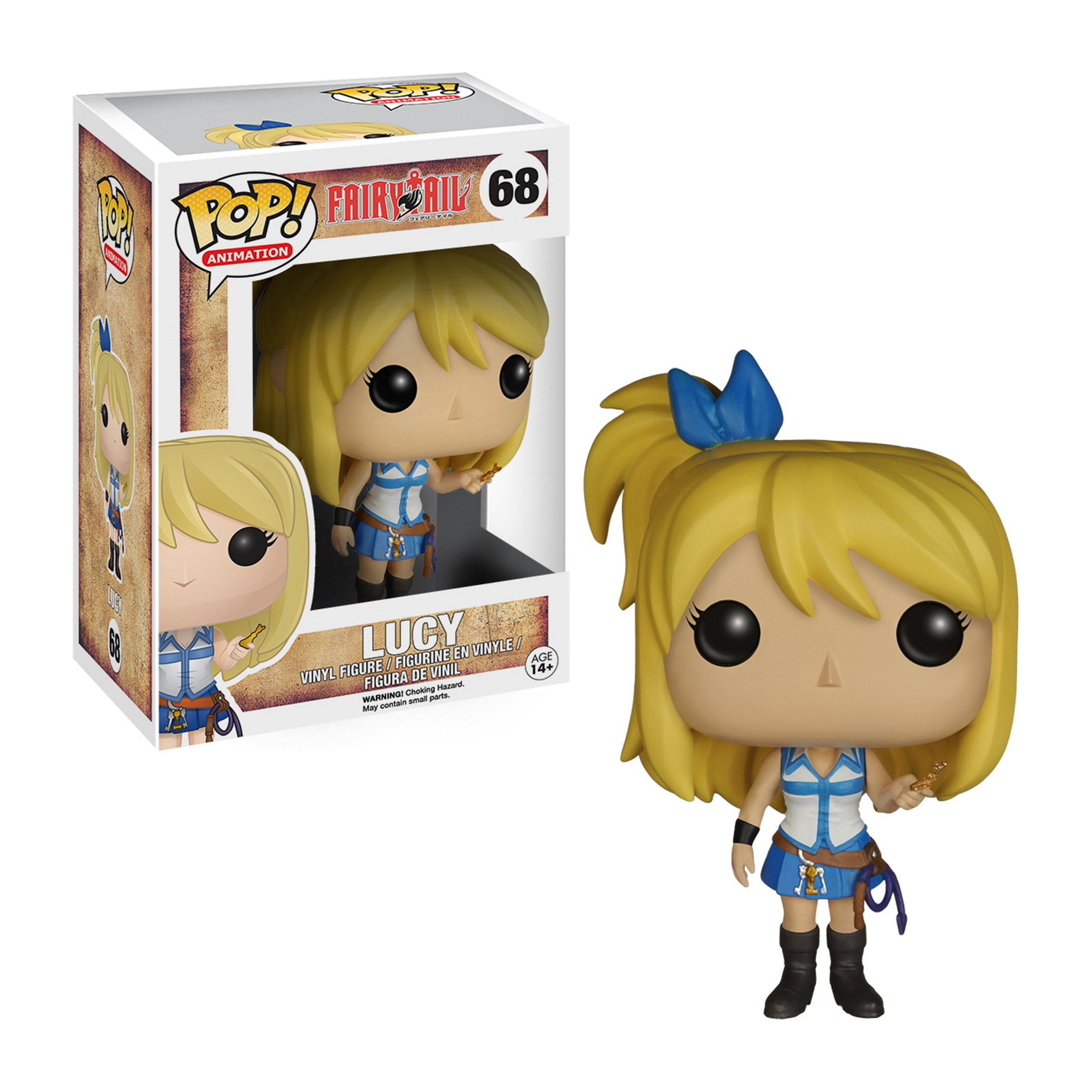 Lucy Figur mit blonden Haaren im Pferdeschwanz, hält einen Schlüssel. Trägt blaues Outfit. In Box.