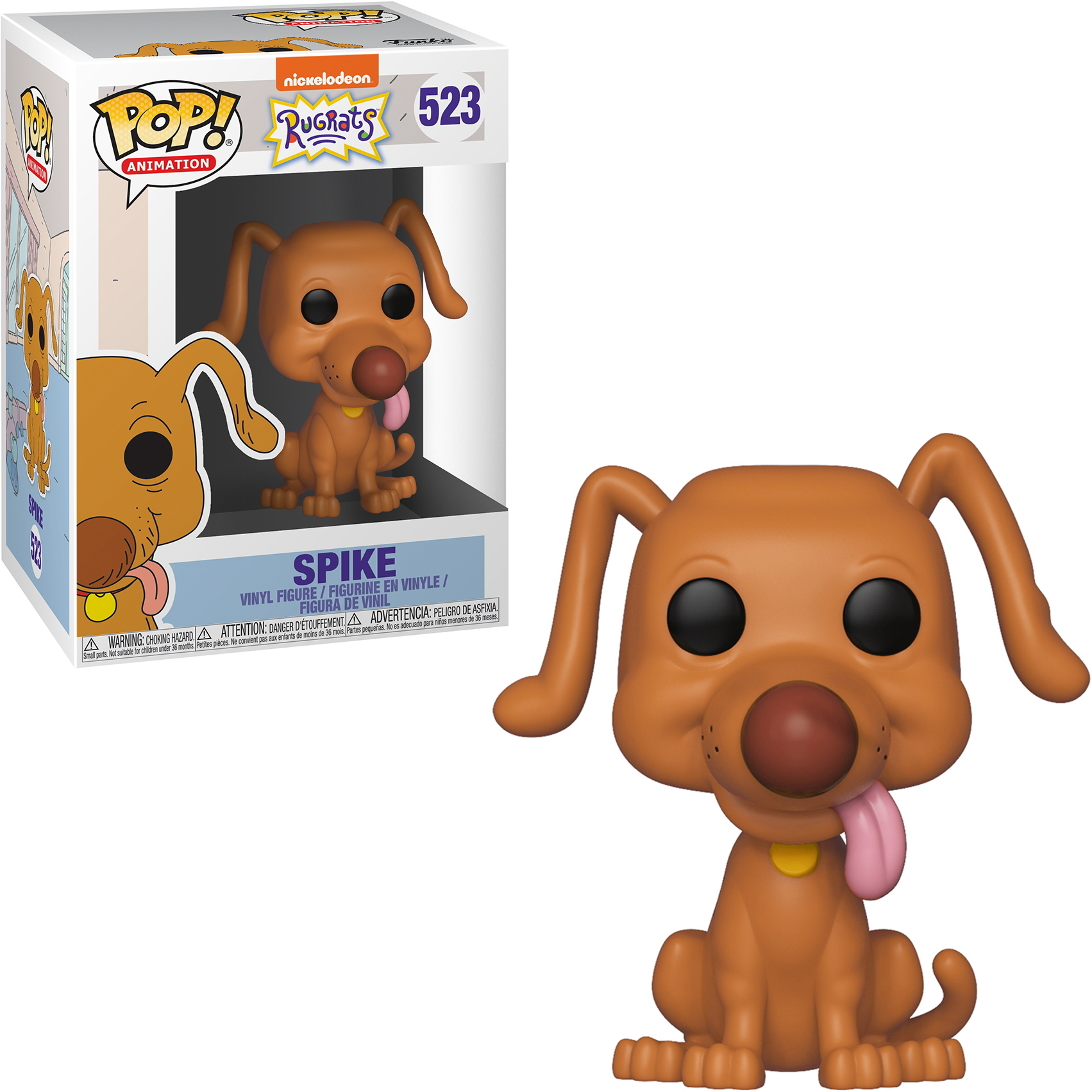 Spike aus Rugrats-Figur mit herausgestreckter Zunge. Die Box mit der Figur ist links.