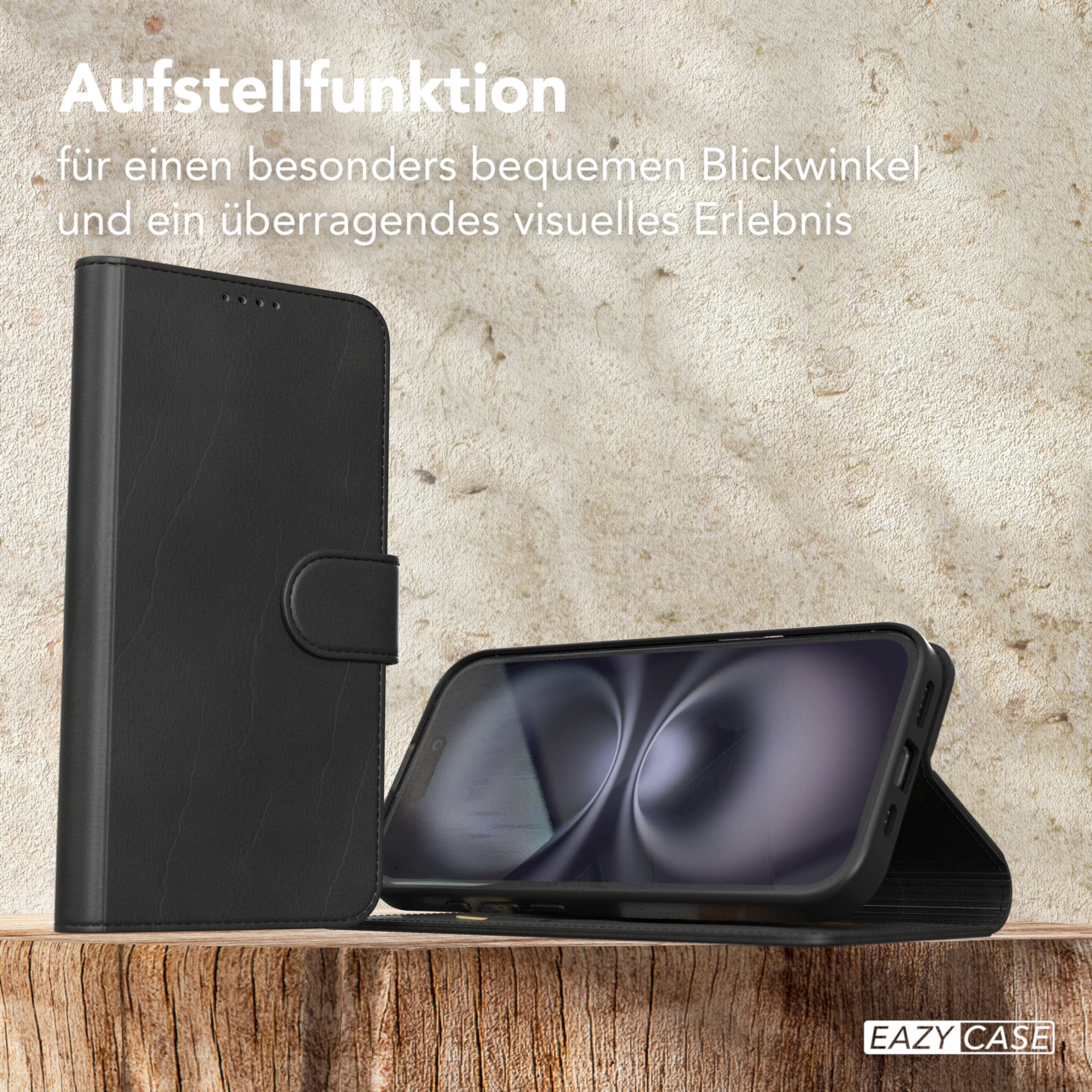 Schwarze Handyhülle stehend und gefaltet. Holz-Tisch mit deutschem Text.