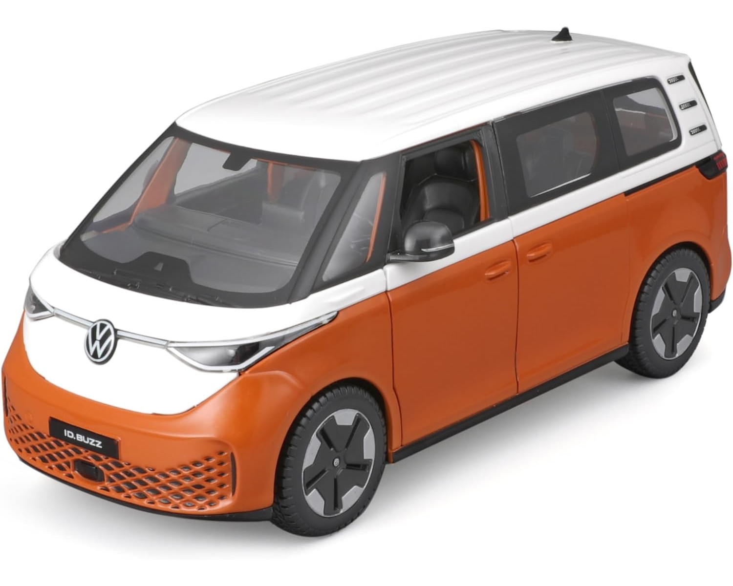 Orangenes und weißes VW ID.Buzz Modellauto. Es hat ein weißes Dach und eine orangefarbene Karosserie.