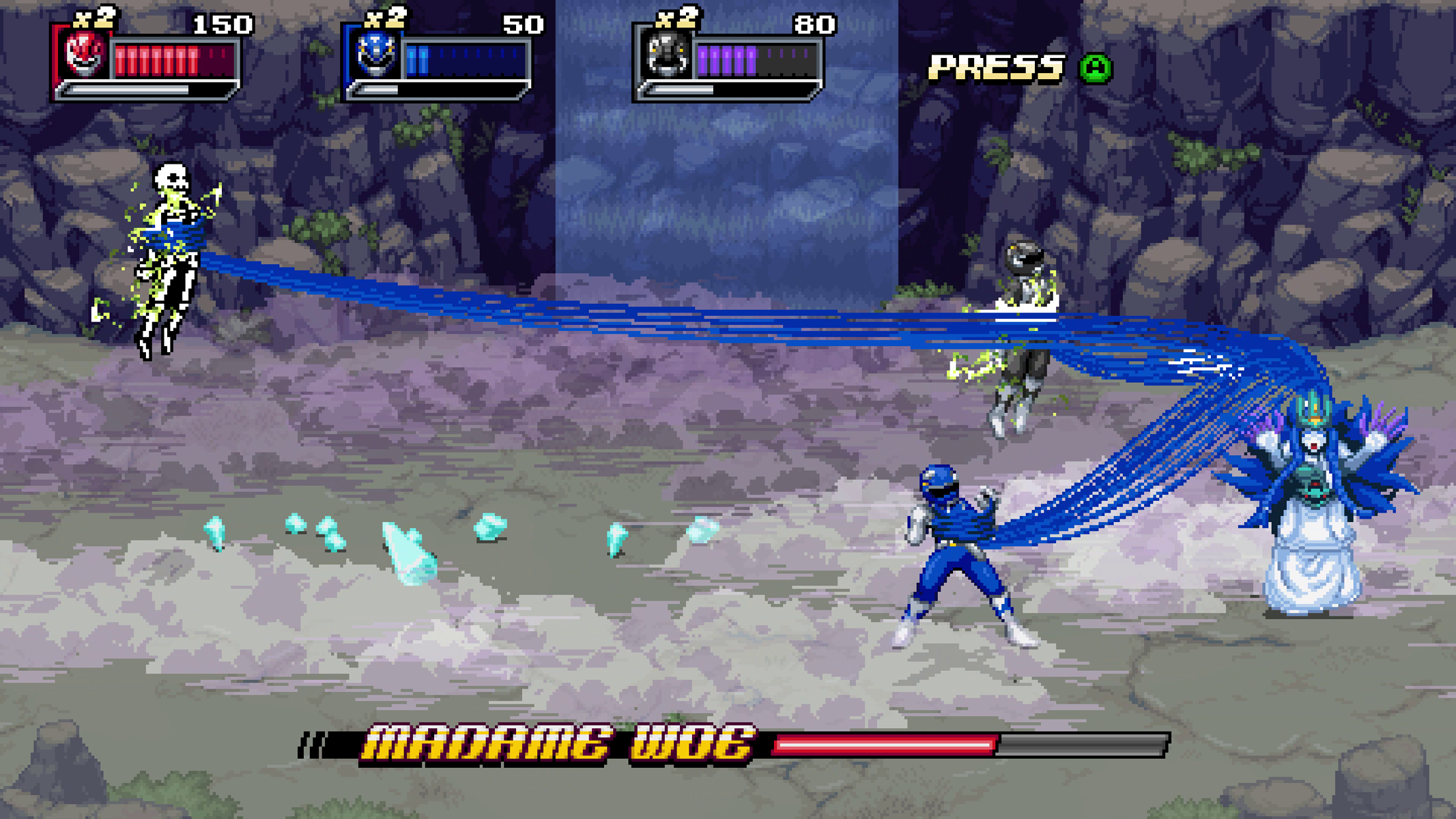 Escena de juego de lucha pixelada. Dos luchadores, un héroe azul y uno verde, luchan contra enemigos.
