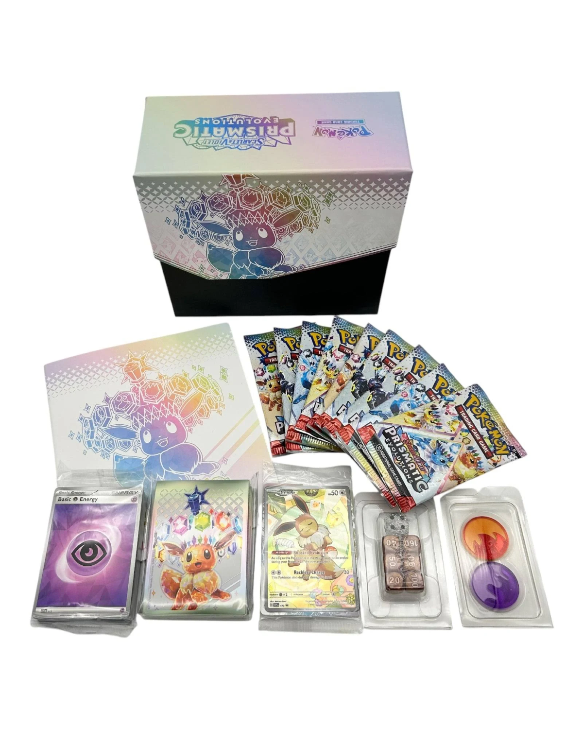 Eine Box mit Pokémon-Karten, Packs und Zubehör. Die Box ist weiß mit Regenbogen-Design.
