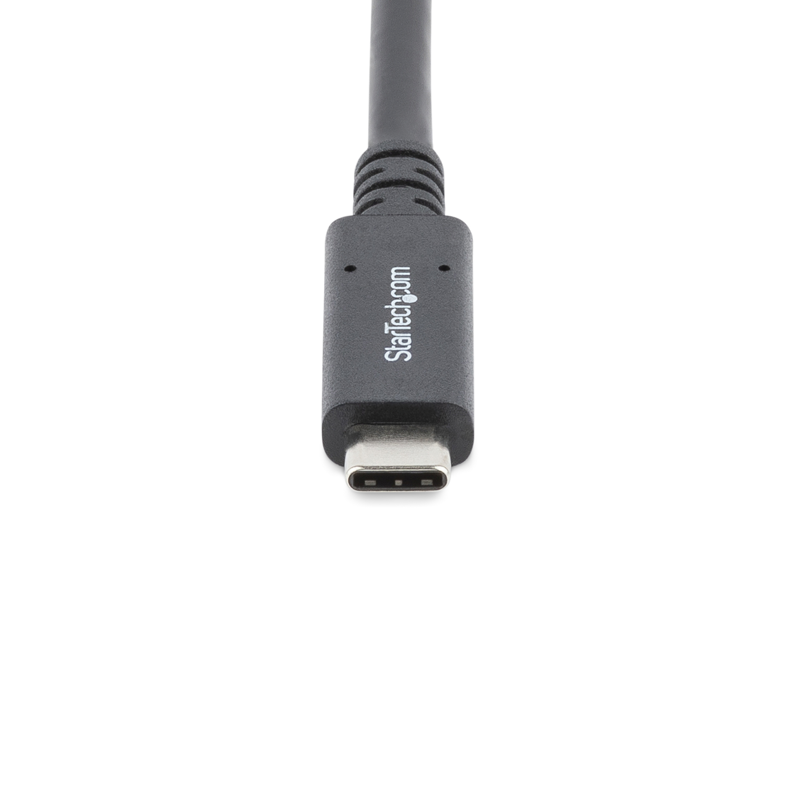 Close-up of a USB-C cable. Connector is black, branded with 'Startech.com'.