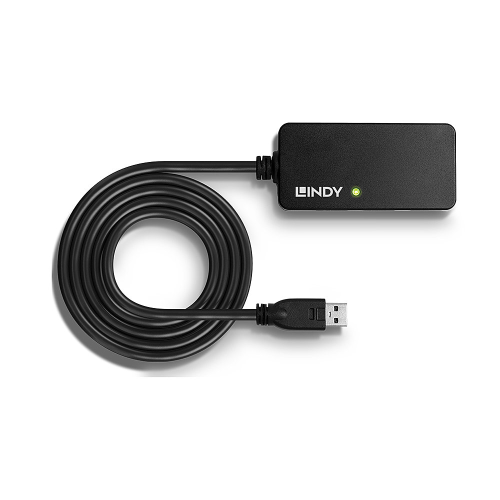 Un adattatore USB nero con un cavo arrotolato accanto, su una superficie bianca.