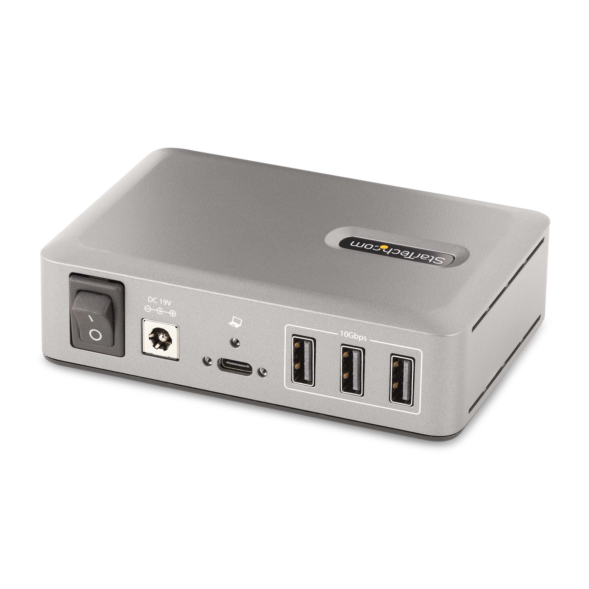 Ein silberner rechteckiger Power-Hub mit mehreren USB-Anschlüssen, einem Netzschalter und einem DC-Eingangsanschluss.
