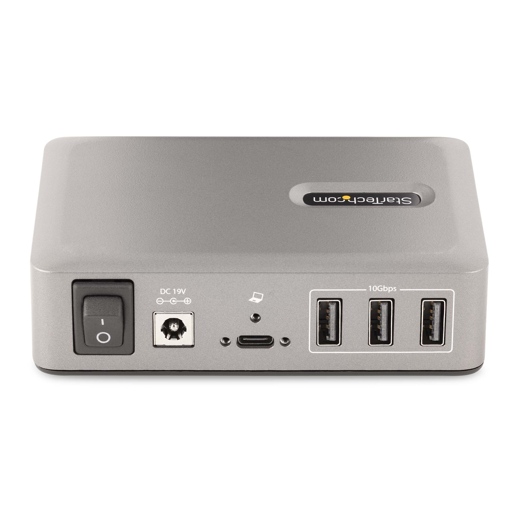 Ein grauer USB-Hub mit mehreren Anschlüssen und einem Ein-/Ausschalter. Der Markenname 'Startech.com' ist sichtbar.