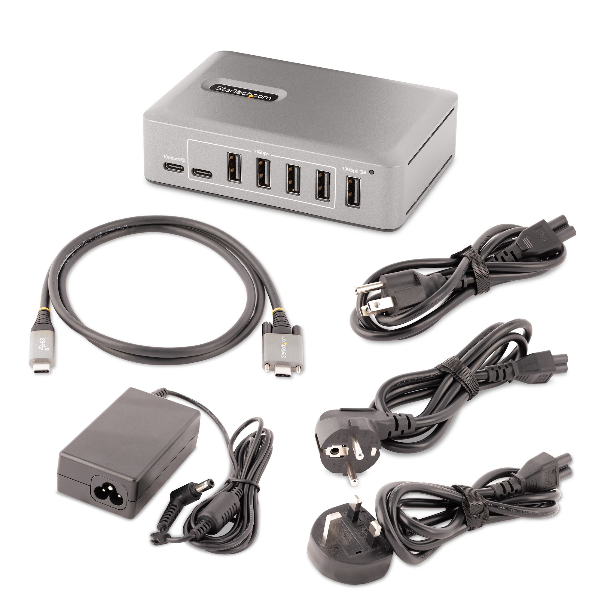 Ein grauer Power-Hub mit mehreren USB- und Stromanschlüssen. Kabel, Stecker und Netzteile sind enthalten.
