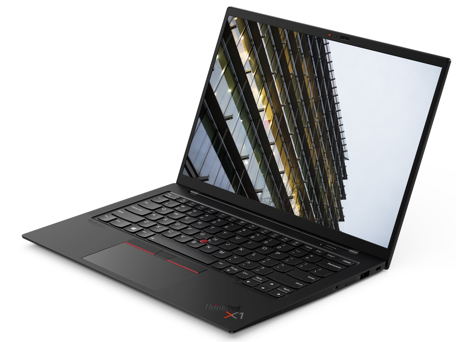 Schwarzer Laptop, der ein Gebäudeinnere mit Glasfassade zeigt.