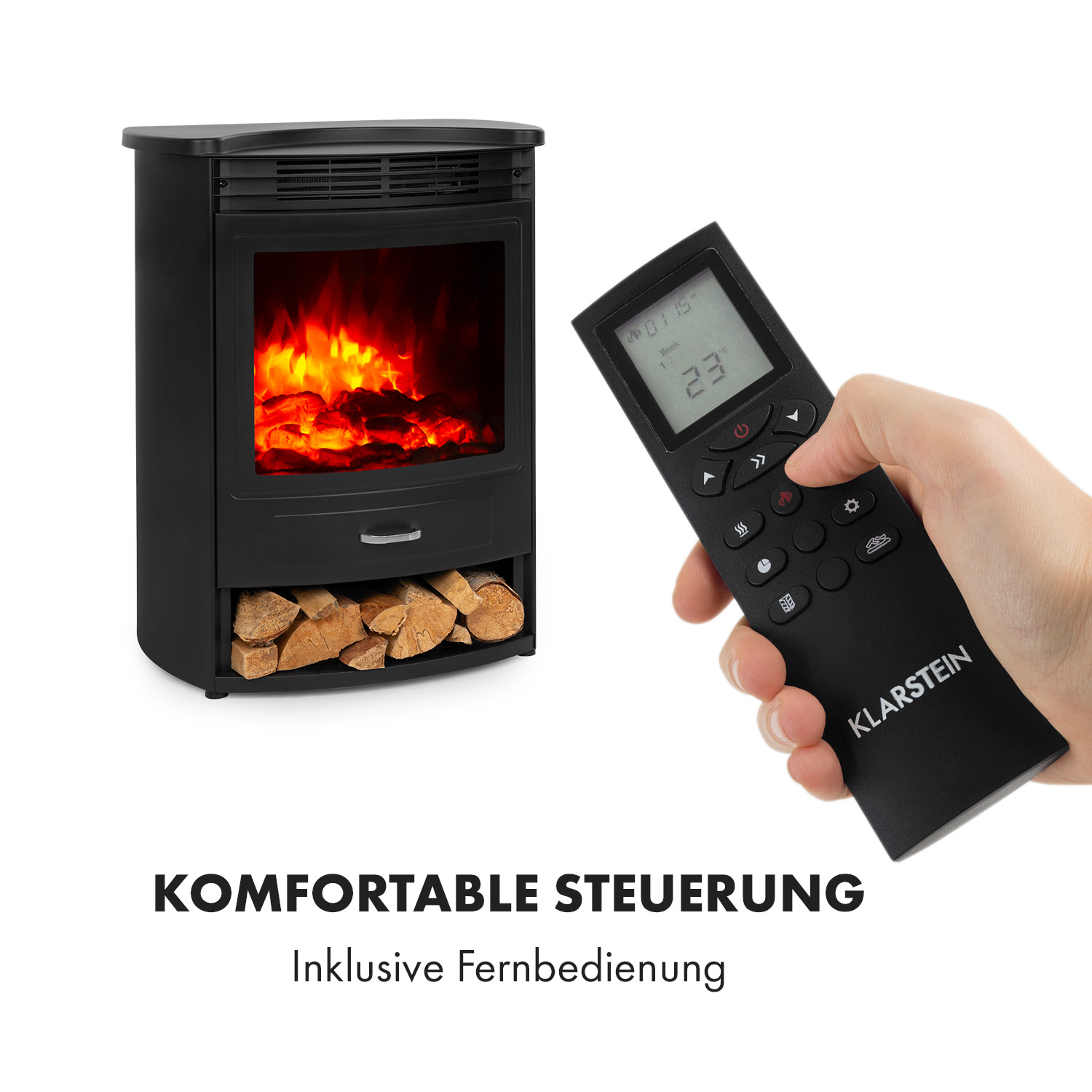 Ein schwarzer Elektrokamin mit Fernbedienung in der Hand.