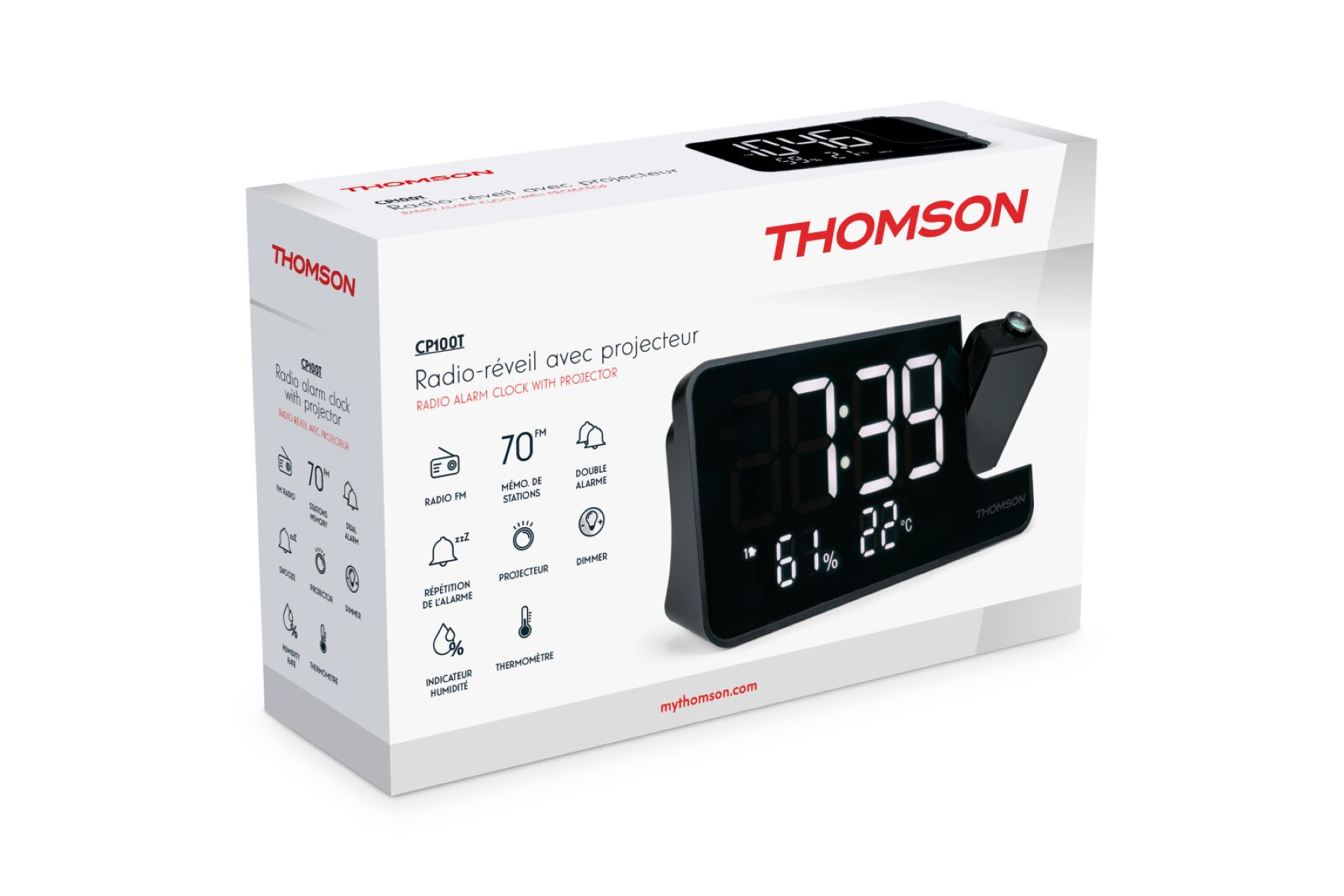Despertador de radio Thomson con pantalla y proyector, en una caja sobre blanco.