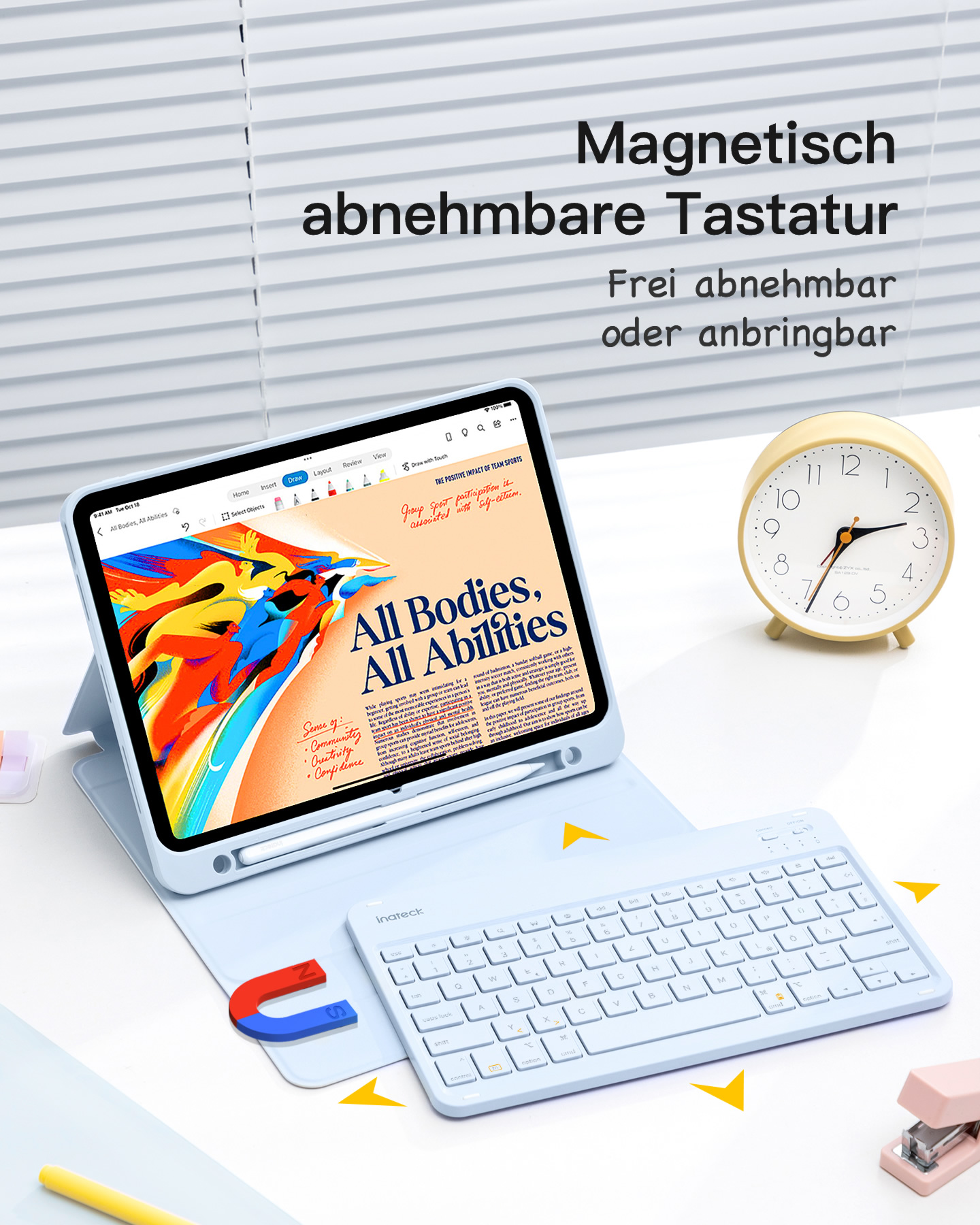 Tablet mit Tastatur, Bildschirm zeigt 'All Bodies, All Abilities', Uhr und Magnet an.