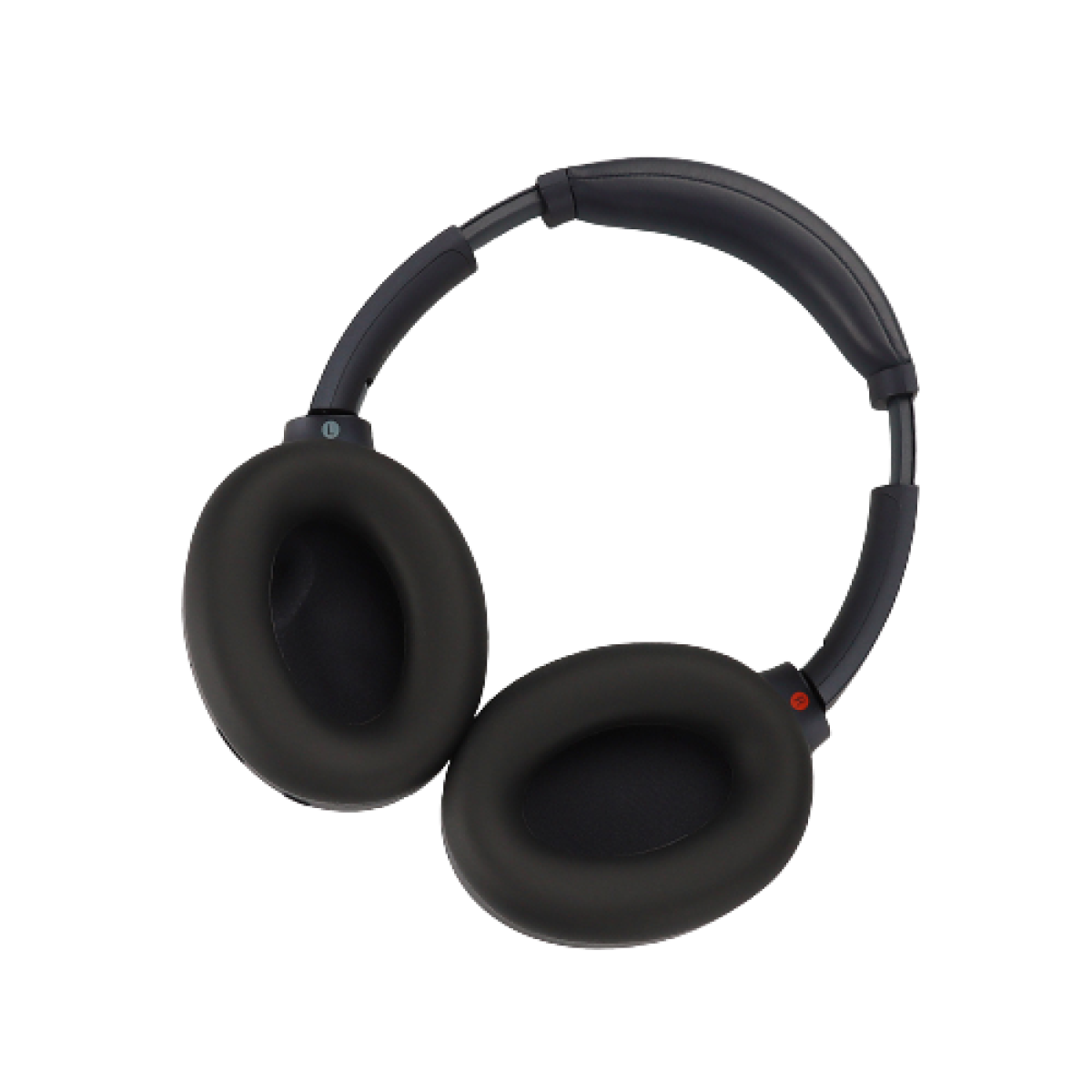 Cuffie nere su sfondo nero. Le cuffie sono in stile over-ear.