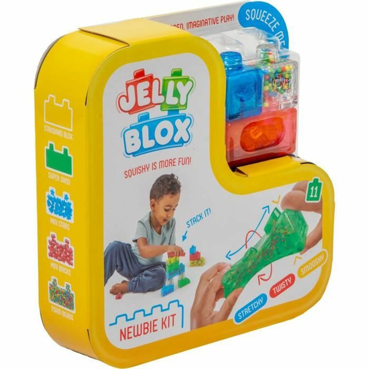 Una scatola gialla con un kit di giocattoli. La scatola presenta illustrazioni del giocattolo e un bambino che ci gioca.