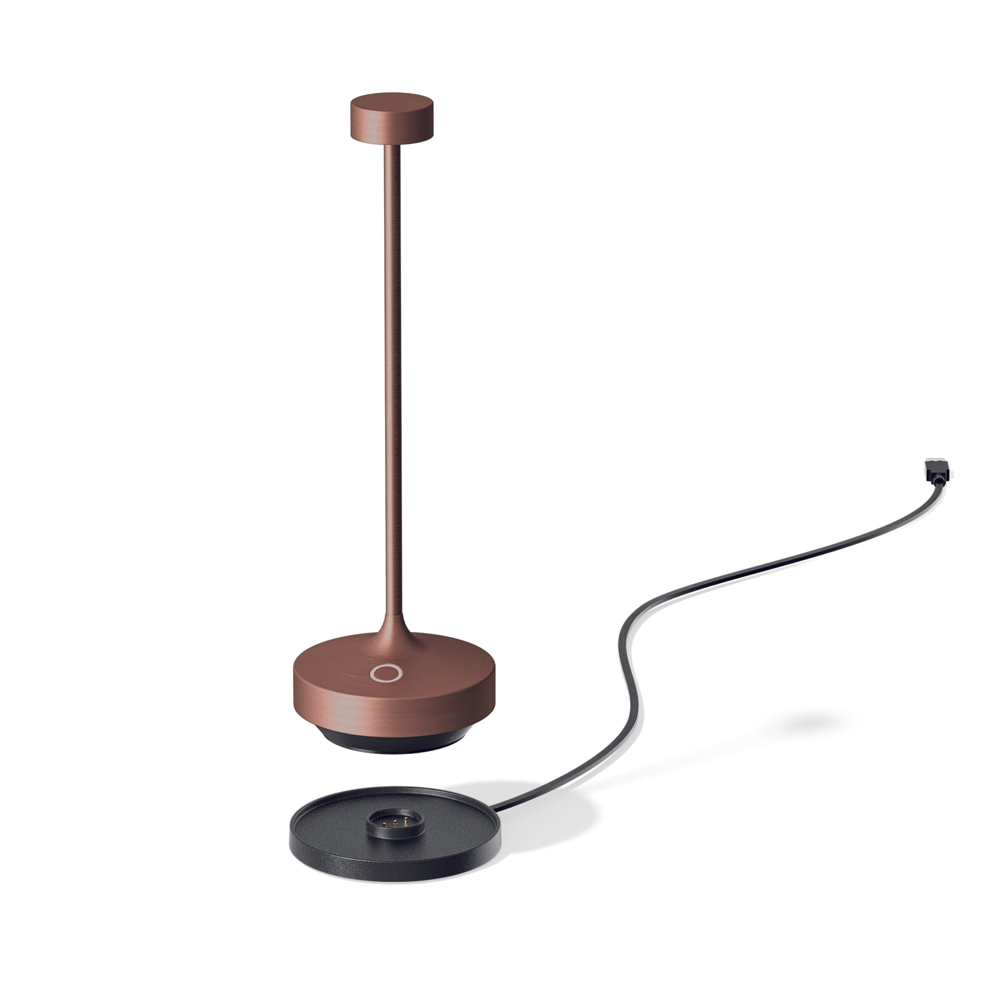 Moderne kupferfarbene Lampe mit passendem Sockel, plus schwarze Ladestation und schwarzes Kabel.