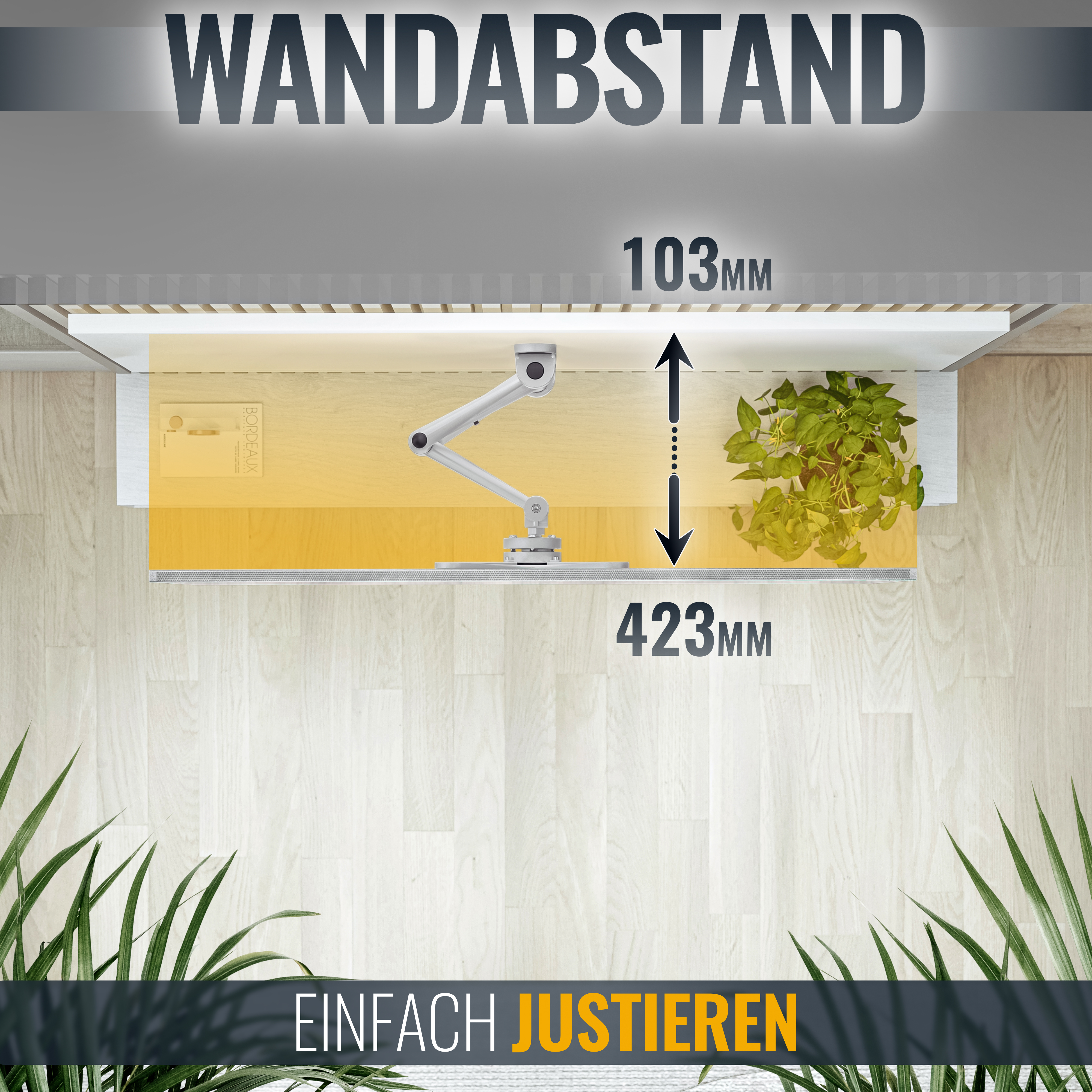 Draufsicht auf ein Setup mit Monitor und Pflanze. Der Monitor ist an einer Wand montiert.