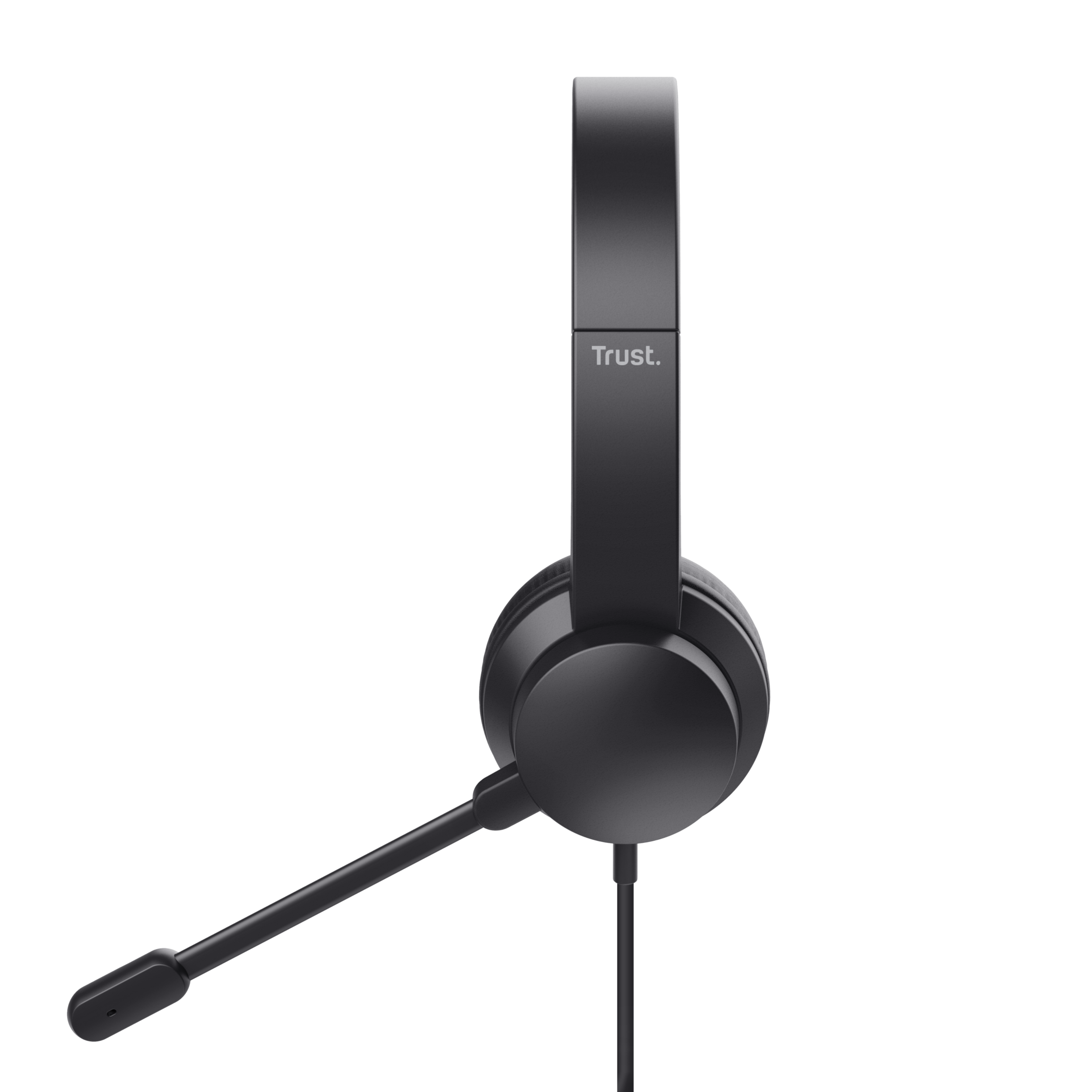 A black headset with a microphone. The brand 'Trust' is visible on the headband. It is against a black backdrop.