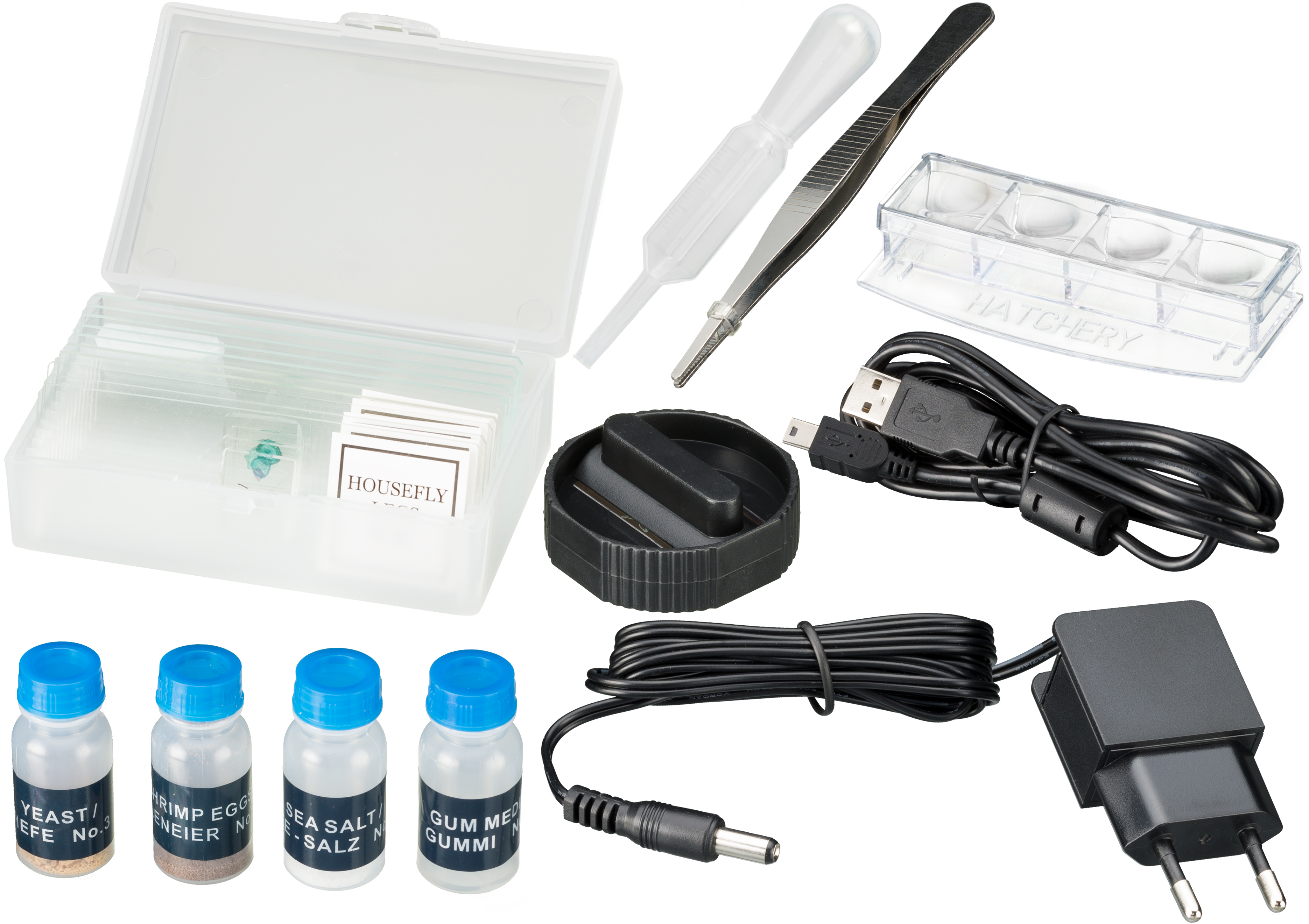 Un kit científico con varias herramientas y recipientes para una configuración de laboratorio, sobre una superficie blanca.