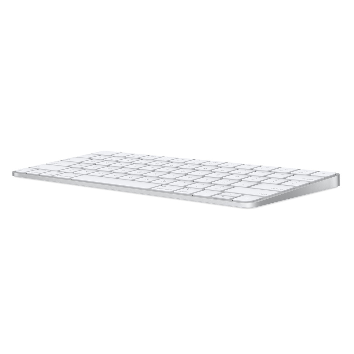 Tastiera Apple bianca su sfondo bianco. La tastiera è piatta e angolata da una prospettiva laterale.