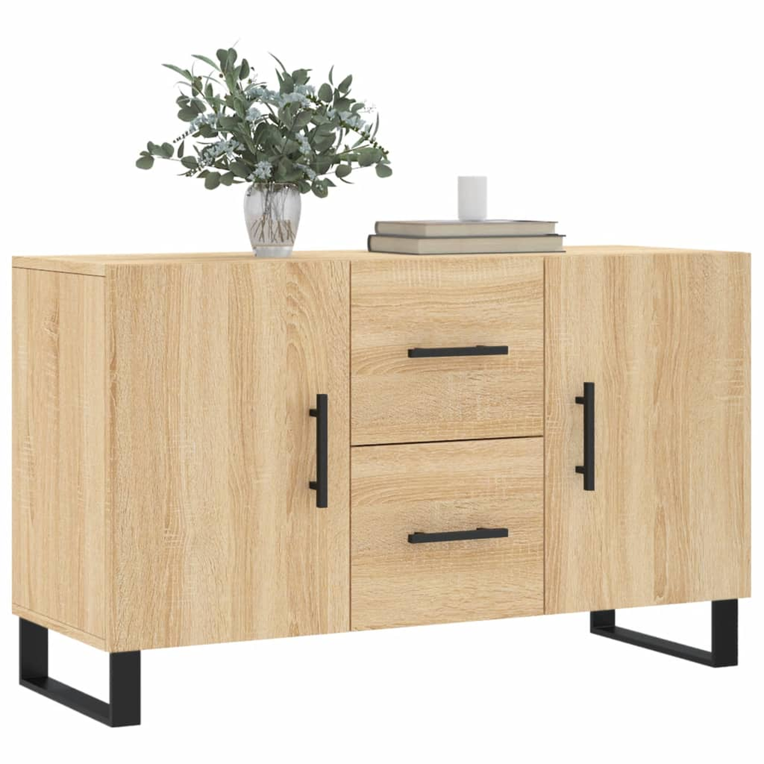 Holzschrank mit zwei Türen und zwei Schubladen. Eine Vase mit Blumen und Bücher sind oben drauf.