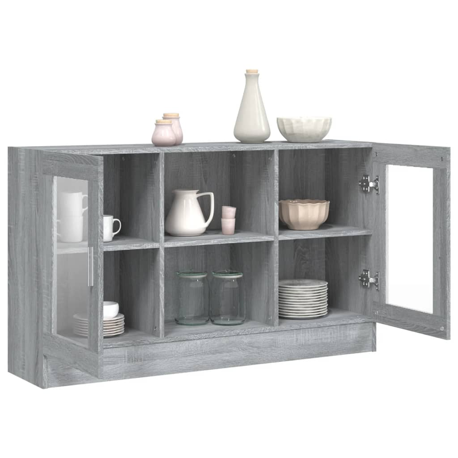 Ein grauer Schrank mit Glastüren, der Regale mit Gegenständen zeigt, und eine Pflanze oben drauf.
