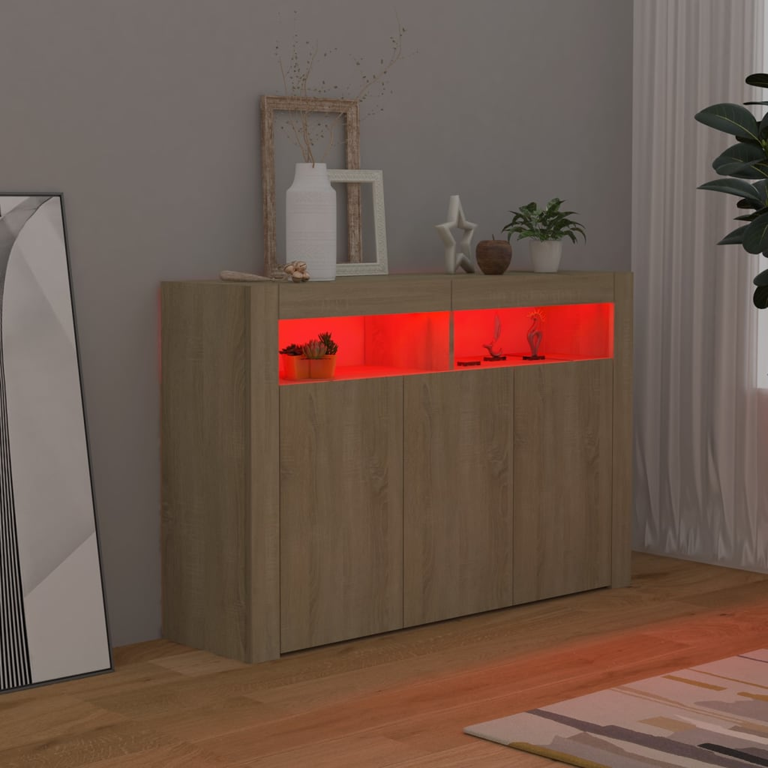 Ein Holzschrank mit rot beleuchtetem Innenraum und oben ausgestellten Objekten.
