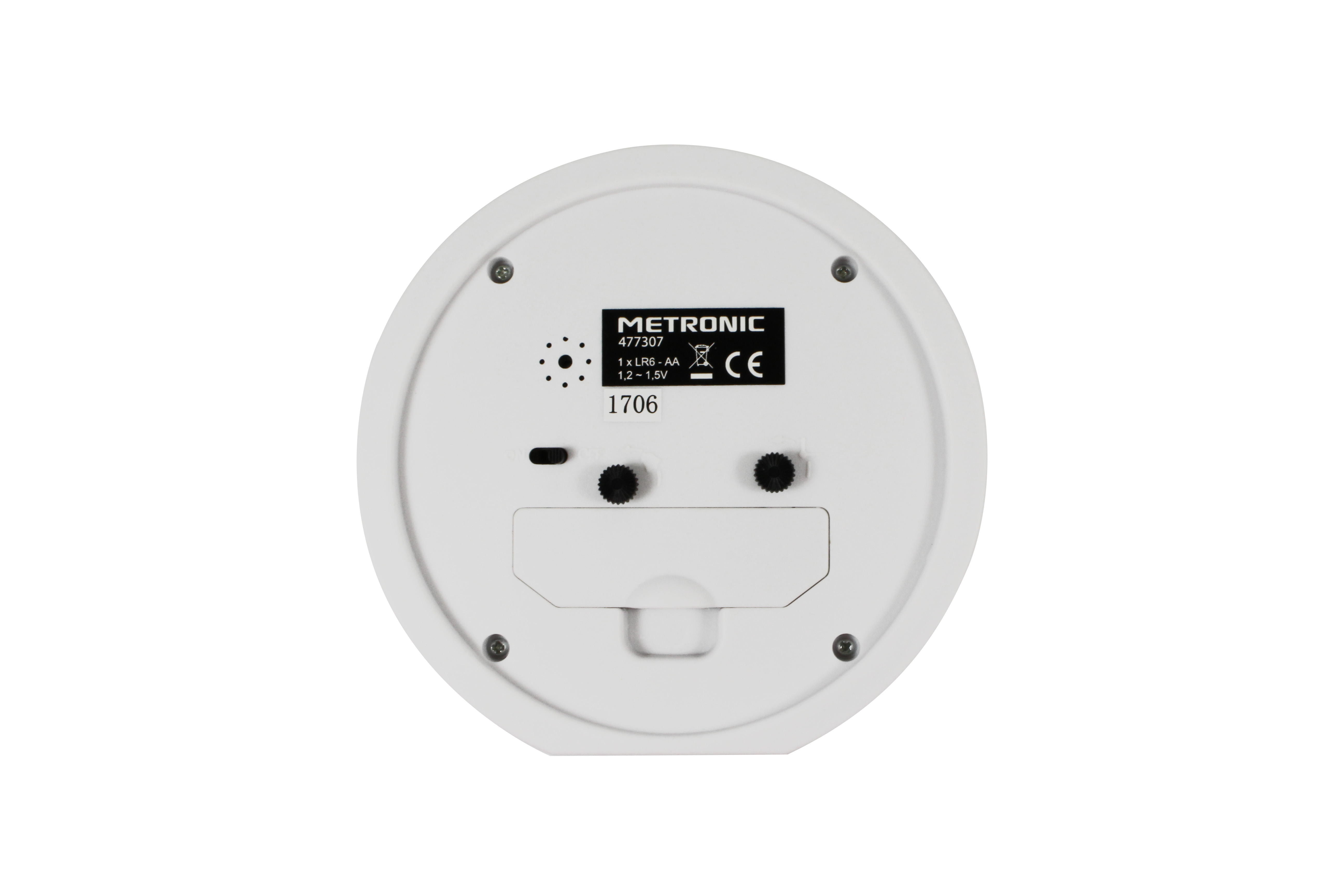 Dispositivo redondo blanco con botones y compartimento de batería. Tiene el logo Metronic.