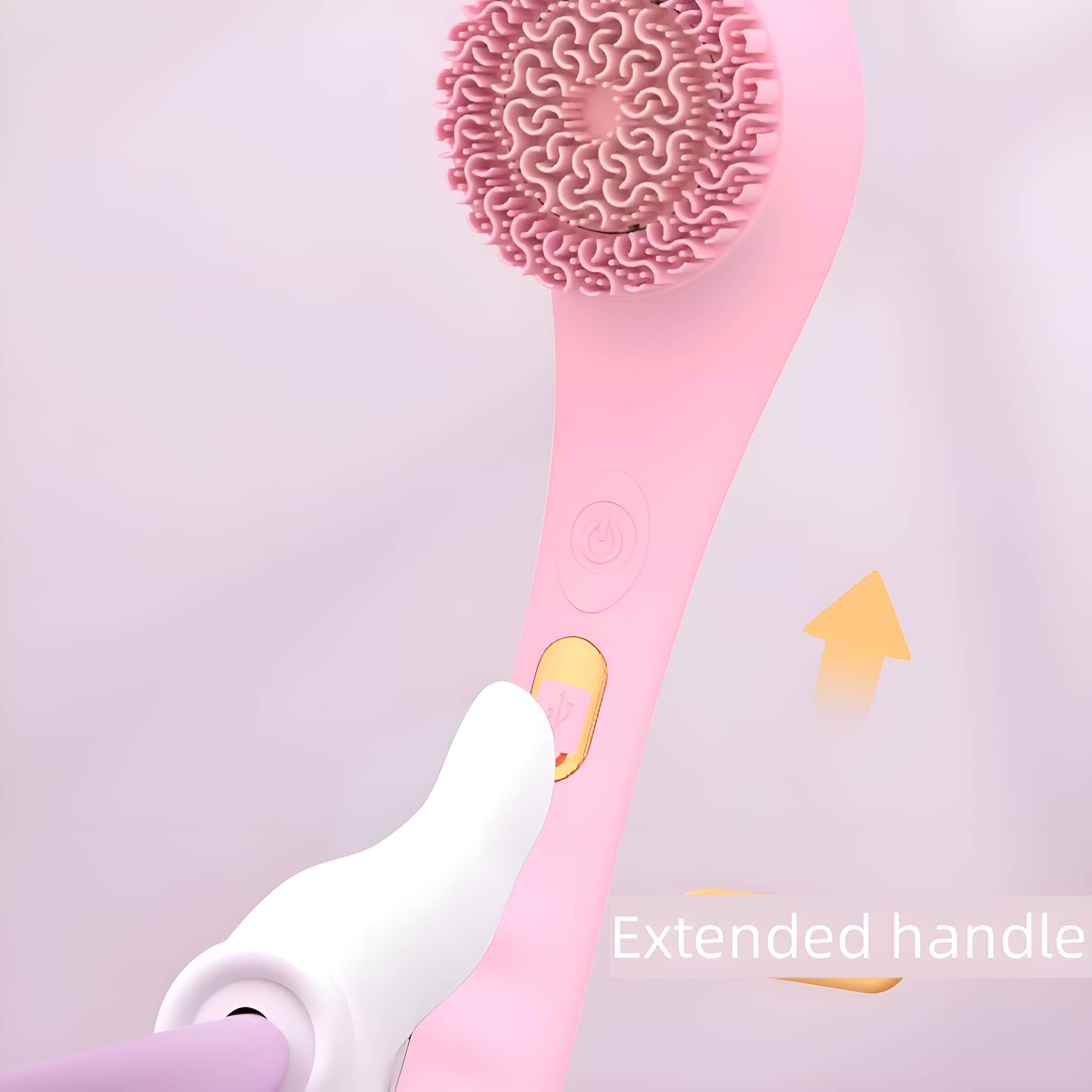 Eine rosa Gesichtsreinigungsbürste mit weißem Griff, Nahaufnahme.