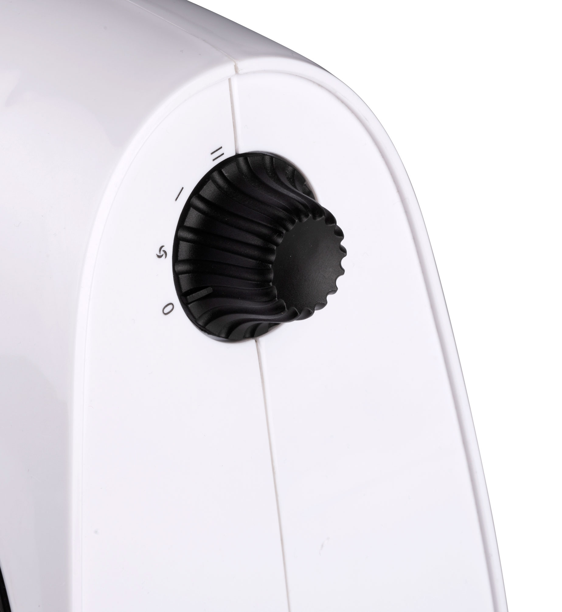 Close-up of a black dial on a white background.
