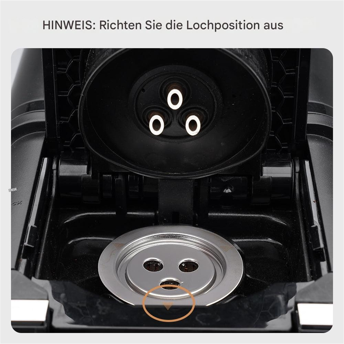 Nahaufnahme einer Küchenspülenablaufbaugruppe, drei Löcher sichtbar.