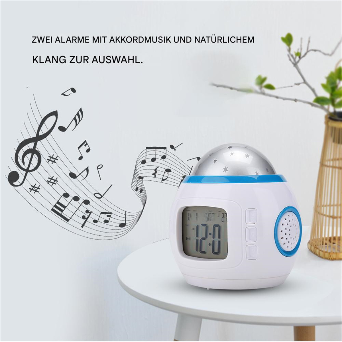 Wecker mit Sternenkuppel, Noten und digitaler Anzeige.