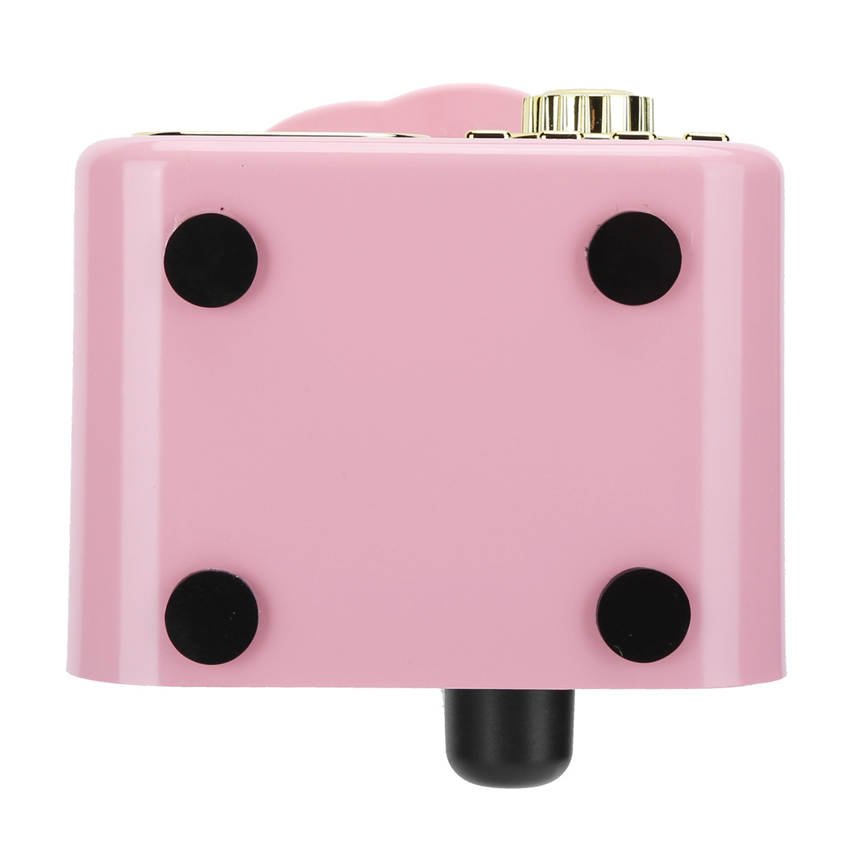 Ein rosa Lautsprecher im Retro-Stil mit schwarzen Füßen und goldenen Akzenten.