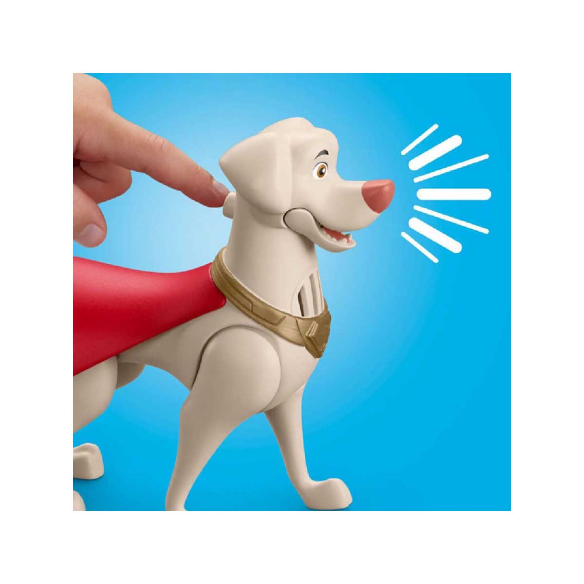 Zabawkowy pies, Superdog, z czerwoną peleryną. Ręka dotyka jego głowy.