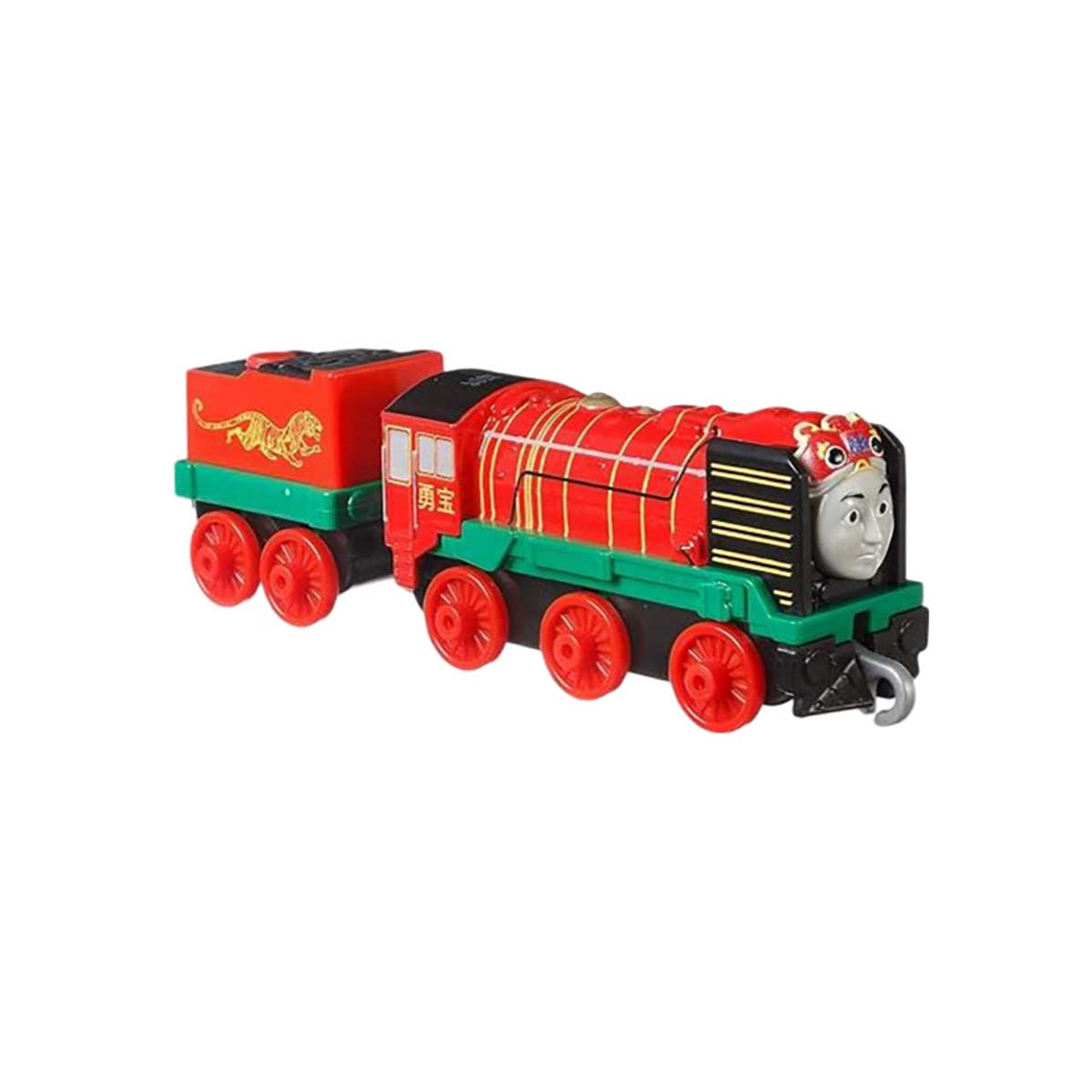 Roter und schwarzer Spielzeugzug, der einen roten und schwarzen Wagen zieht. Weißer Hintergrund, Kinderspielzeug.