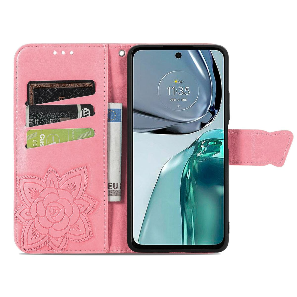 Geöffnete rosa Handyhülle mit Karten und Bargeld, neben einem Telefon.
