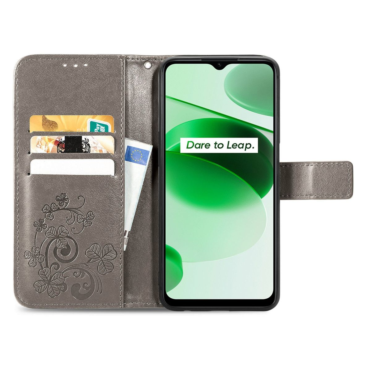 Graue Handyhülle geöffnet, zeigt Karten, einen Stift und den Telefonbildschirm mit dem Text 'Dare to Leap'.