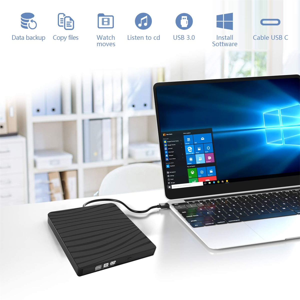 Schwarzes DVD-Laufwerk, verbunden mit einem Laptop. Über dem Laptop-Bildschirm befinden sich Funktionssymbole.