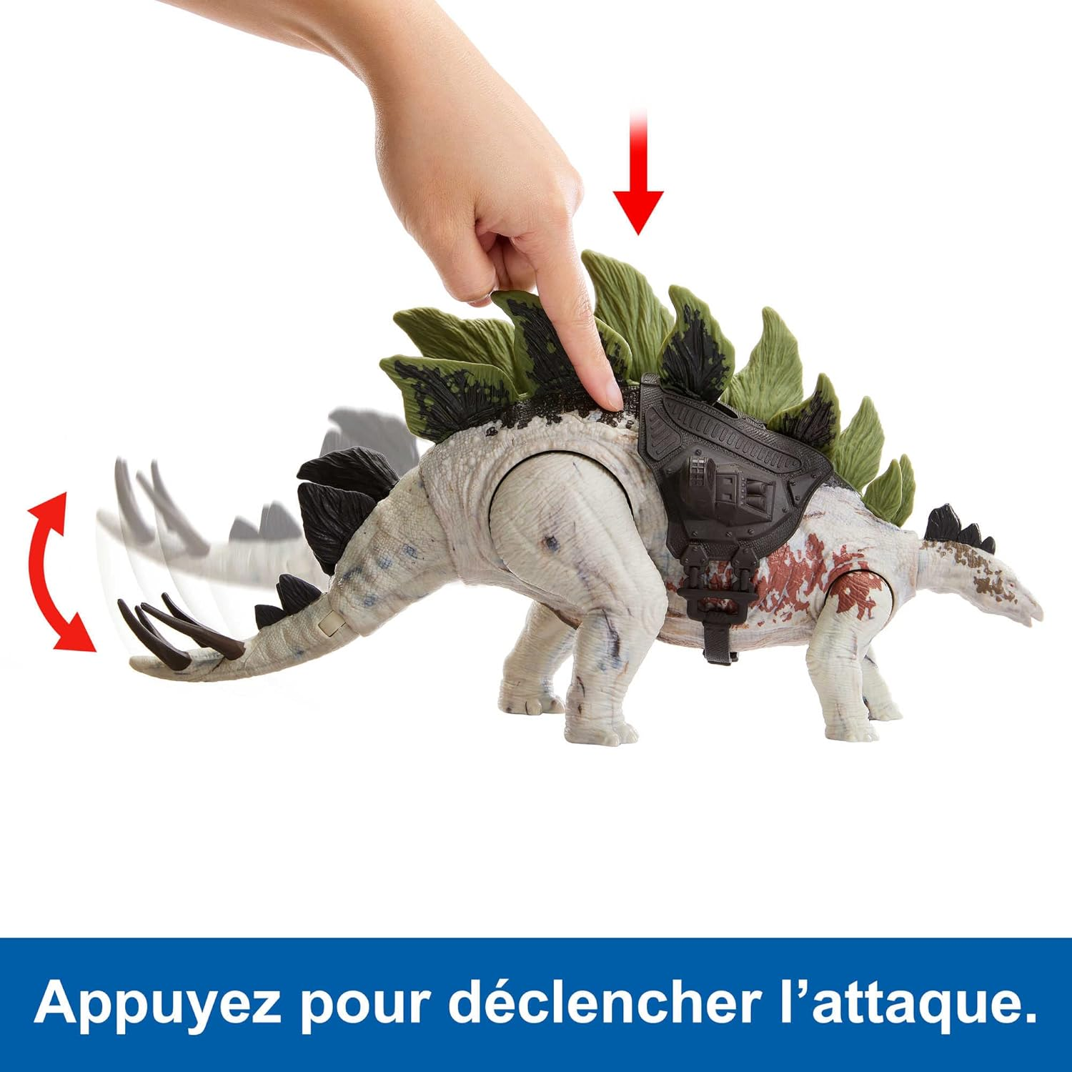 Una mano preme un giocattolo di dinosauro, con una freccia. Testo: Premi per attivare l'attacco.
