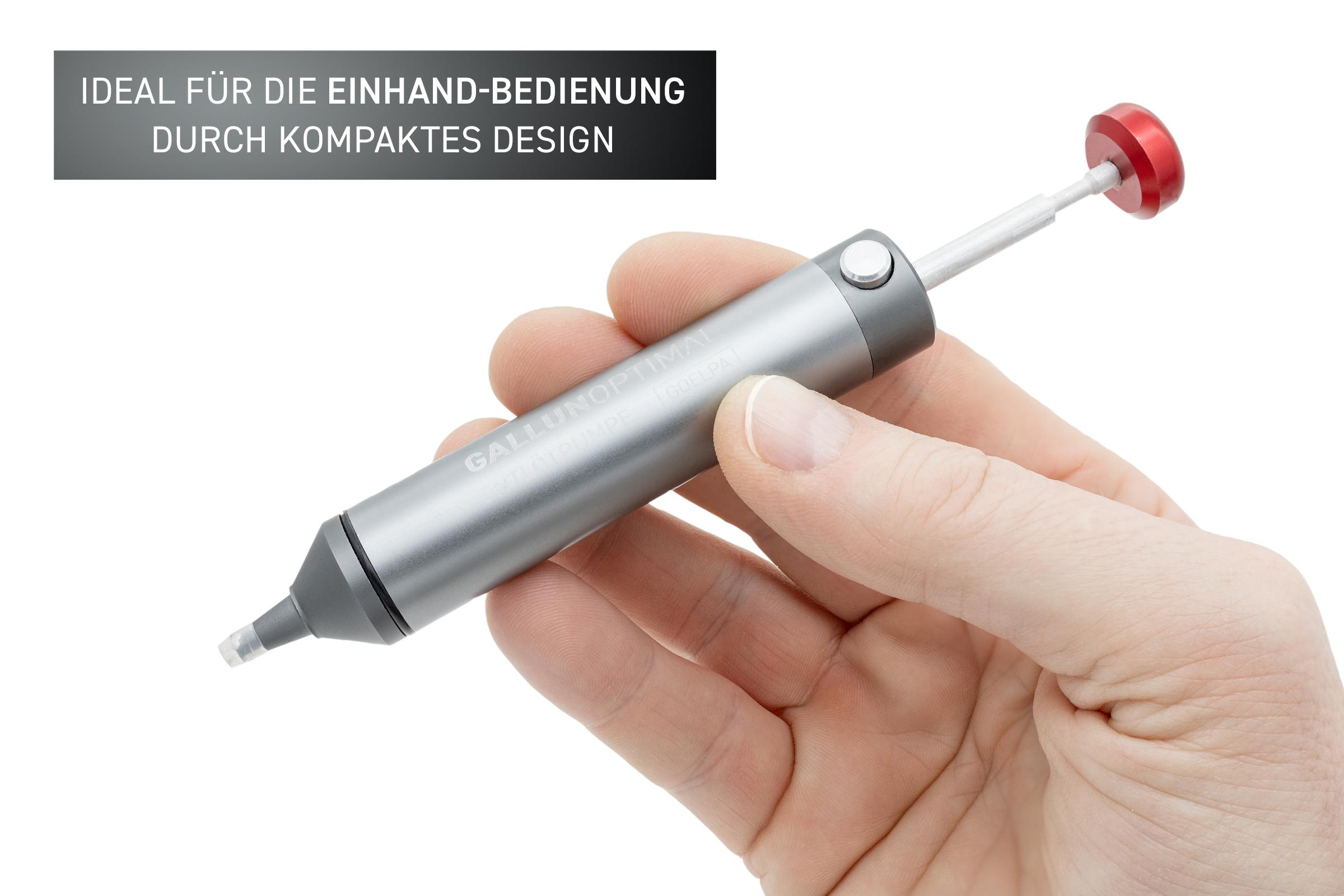 Hand, die ein silbernes und rotes stiftähnliches Gerät hält, Text auf Deutsch.