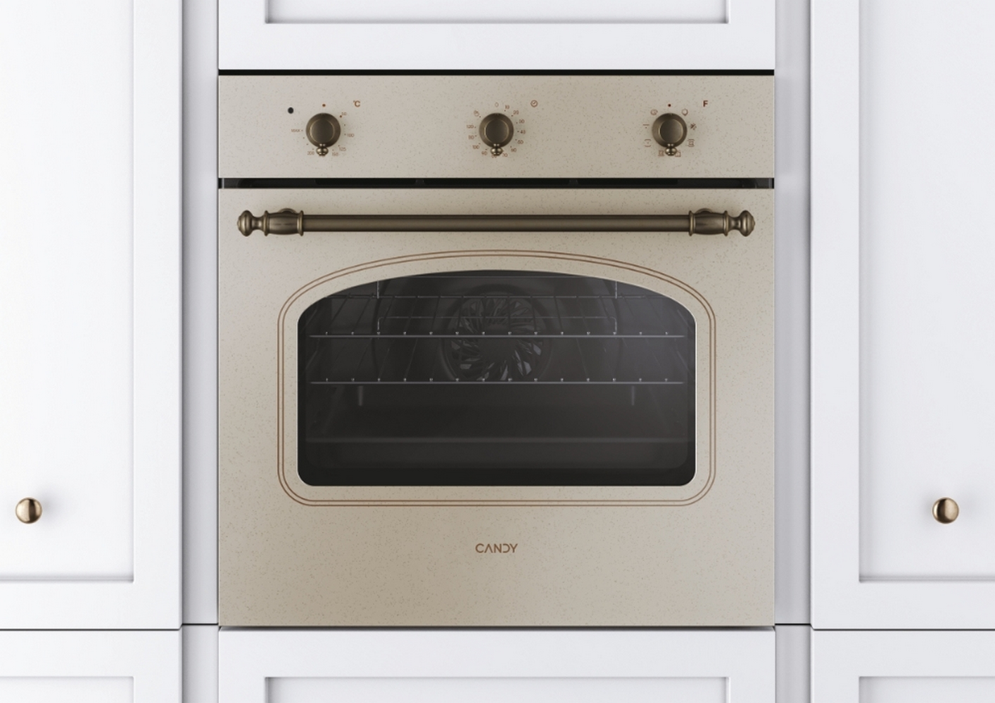 Forno a incasso color crema con maniglia scura e tre manopole. Situato tra mobili bianchi.