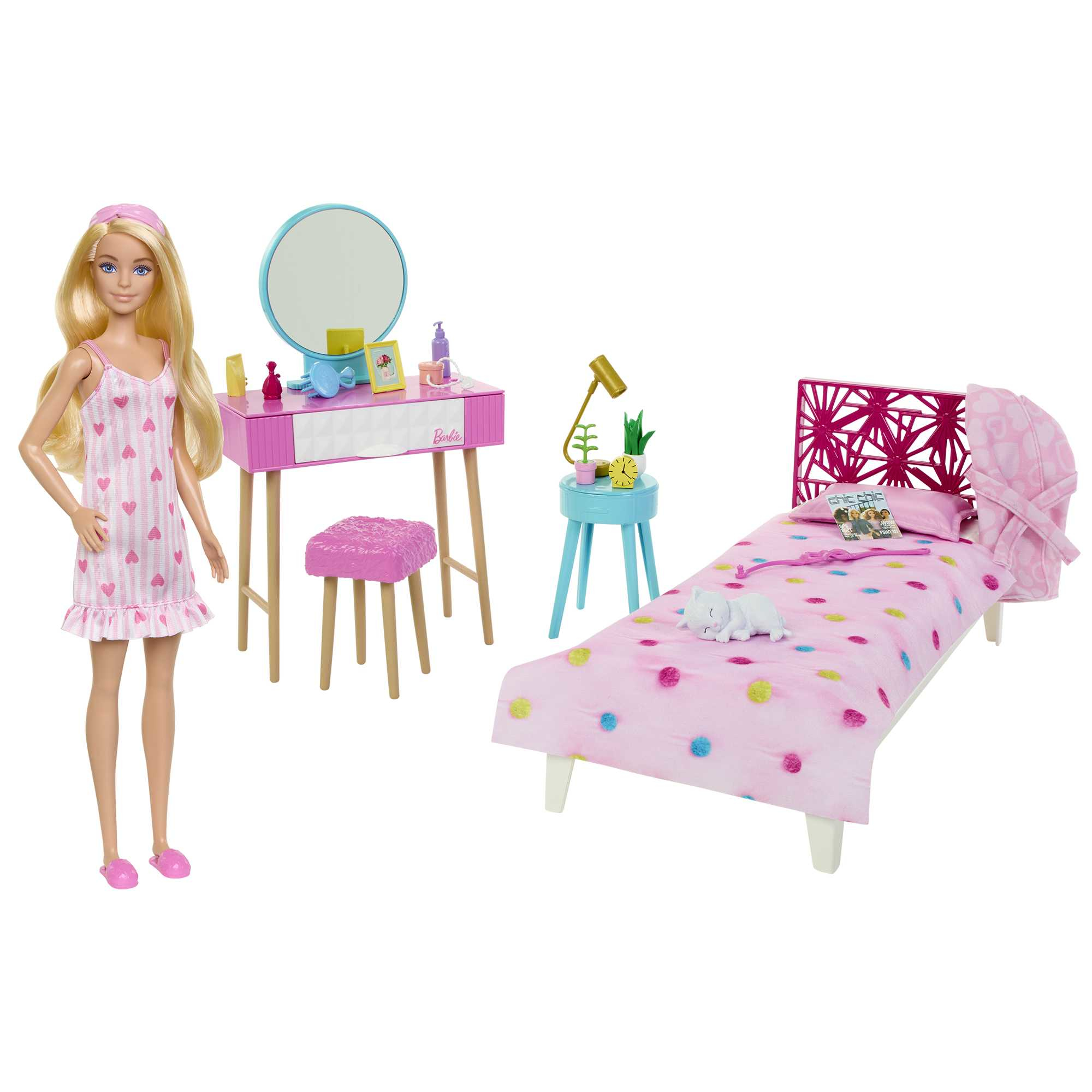 Muñeca Barbie y juego de dormitorio. Cama rosa, tocador y mesita auxiliar. Accesorios presentes.