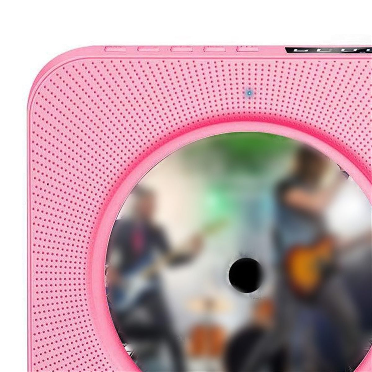 Ein pinkfarbener tragbarer CD-Player mit einer CD. Er hat einen Lautsprecher und ein verschwommenes Bild.