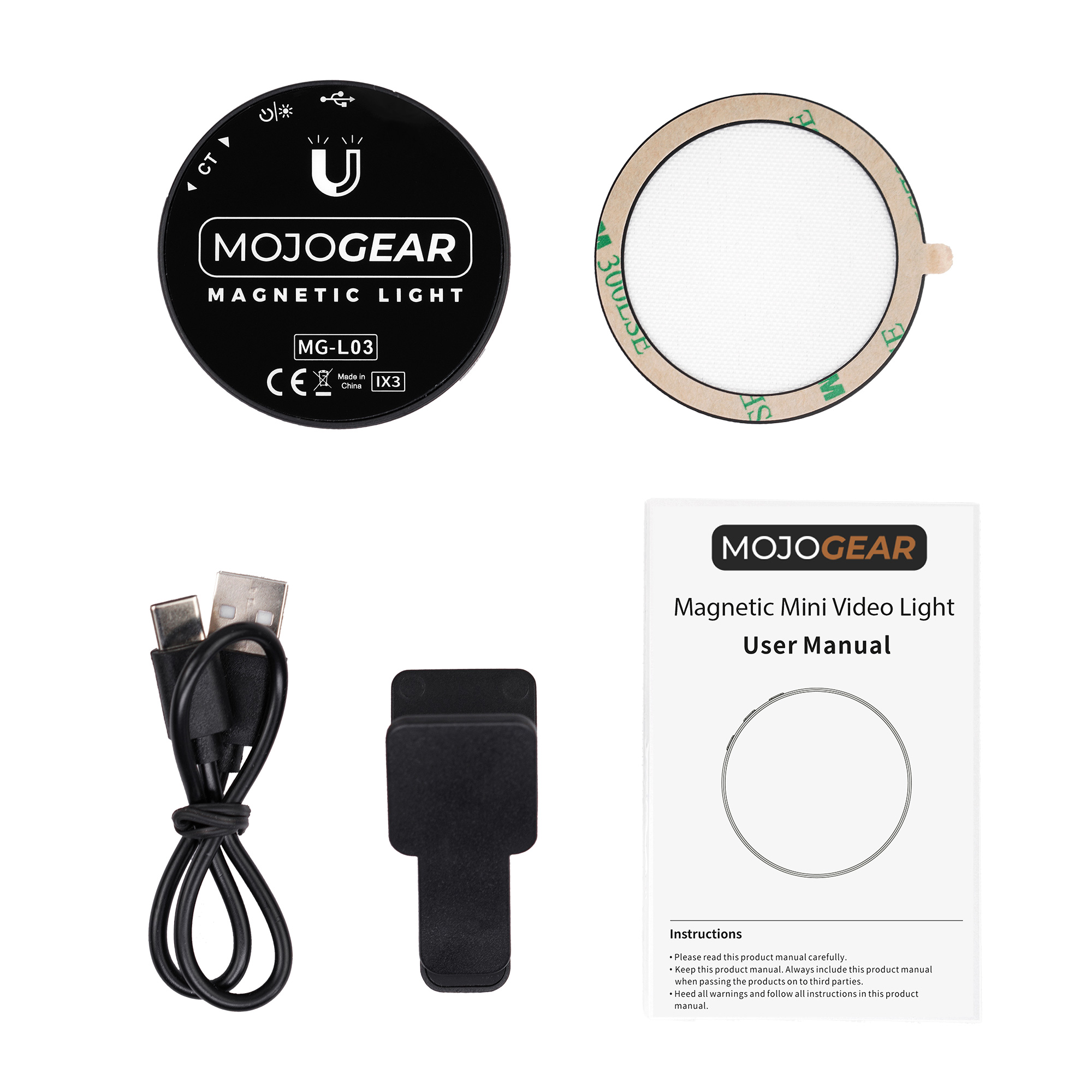 Mini video light, charger, and user manual. The light is round and black.