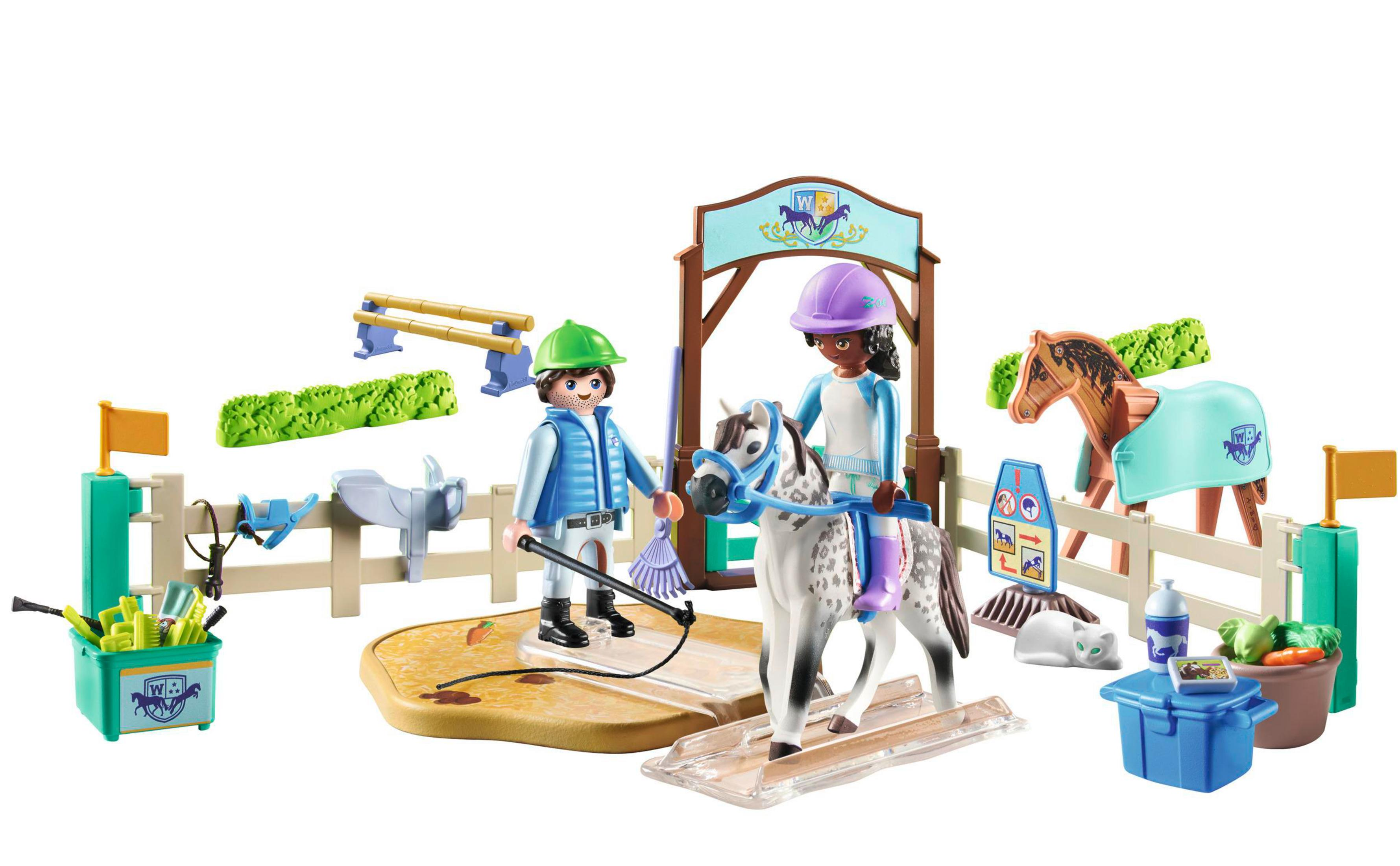 Set di equitazione Playmobil. Include personaggi, cavallo, recinzione, salti e accessori.