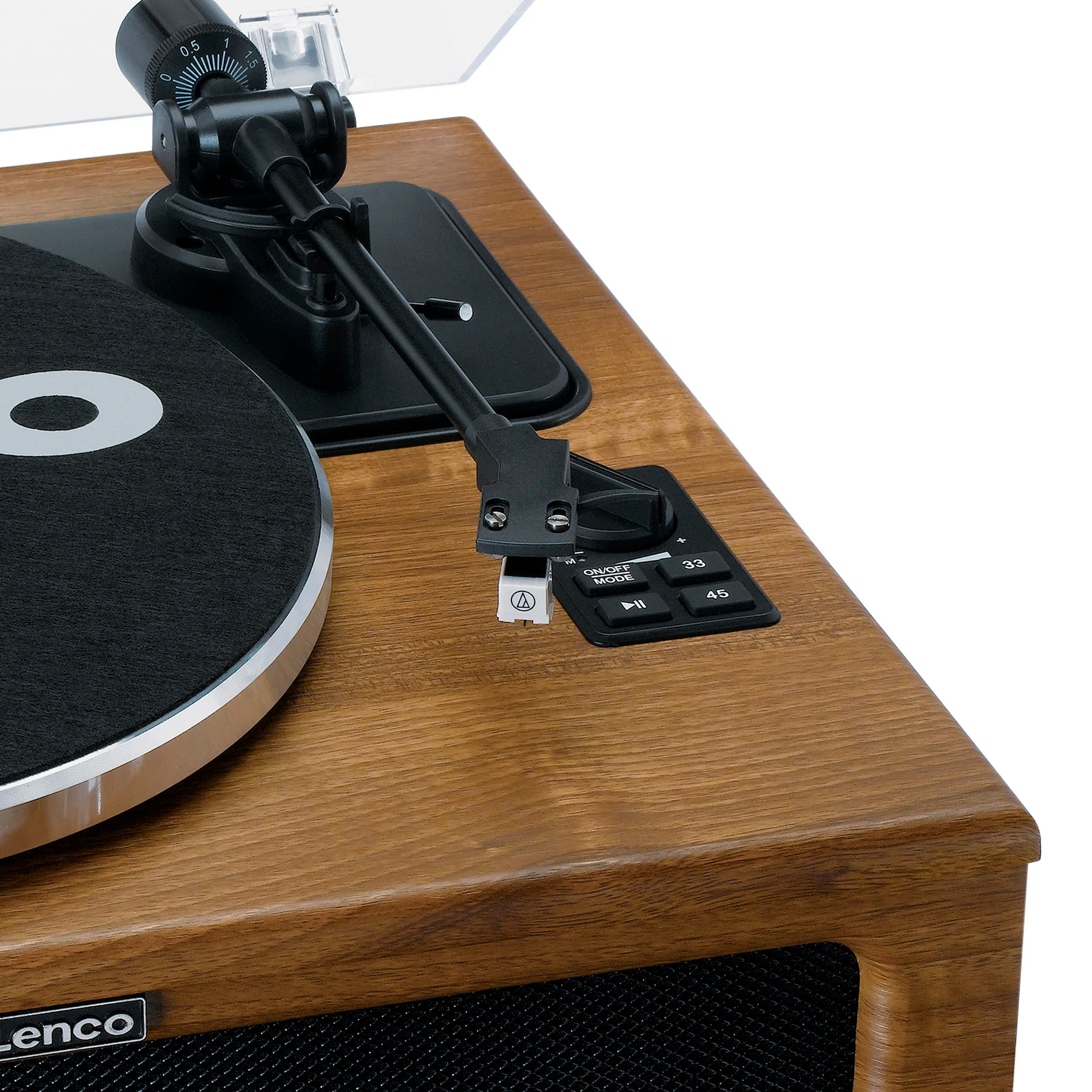 Primer plano de un tocadiscos con acabado de madera. El brazo fonocaptor es visible, junto con los botones.