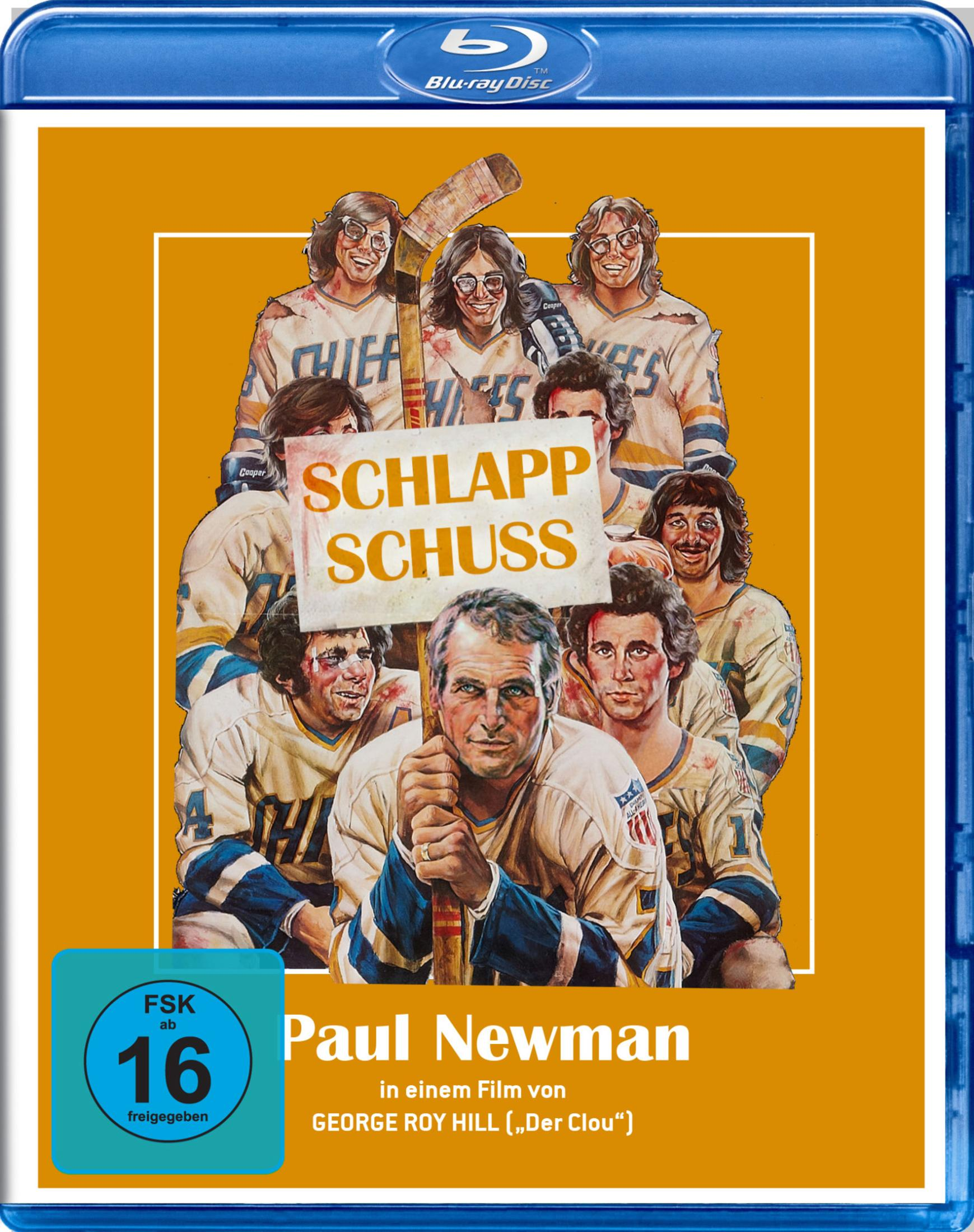 Un groupe de joueurs de hockey avec une pancarte "Slap Shot". Paul Newman devant.